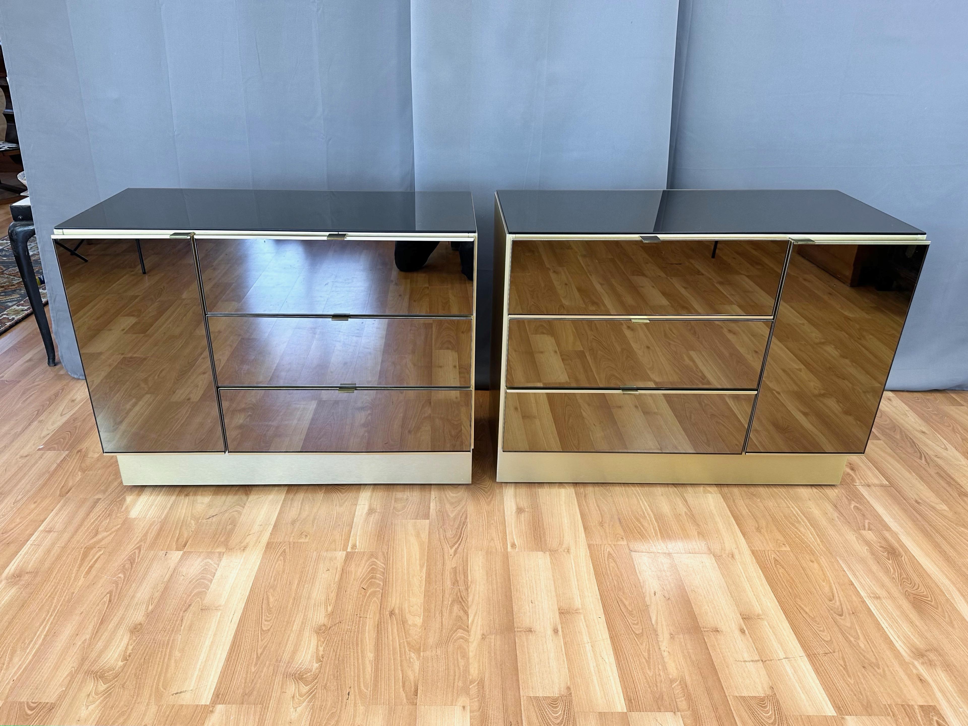 A super chic late 1970s/early 1980s mirrored bachelor chest with brass-colored anodized aluminum sides by O.B. Solie for Ello Furniture Company. Two available, with ‘A’ on the left and ‘B’ on the right in the primary image.

Minimalist Hollywood