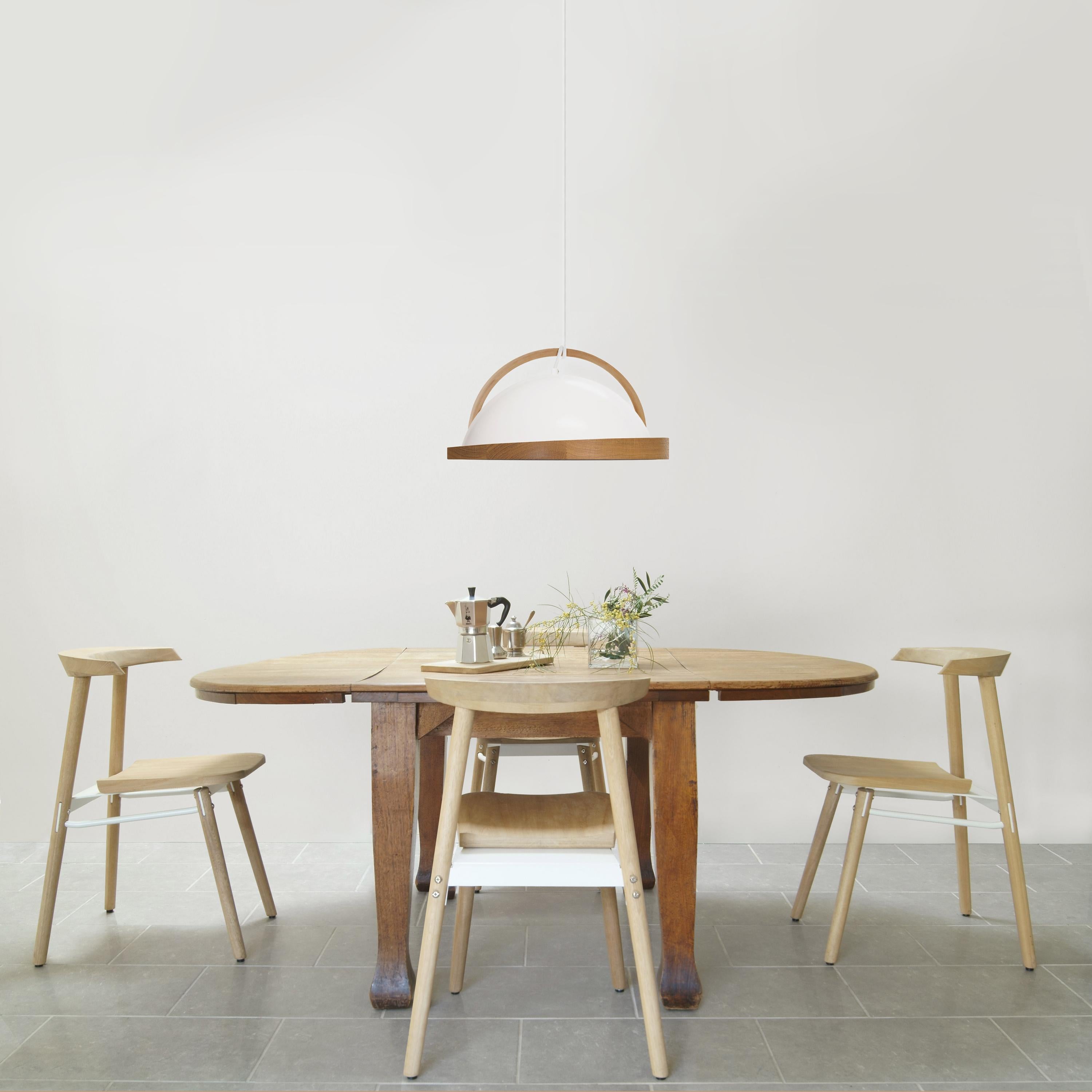 Obelia pendant lights are a collection of local artisan made spun aluminium lights with angled natural solid timber rims as their feature. With the additional bent timber arc and timber dowel, Obelia will hang cozily in all environments.

The