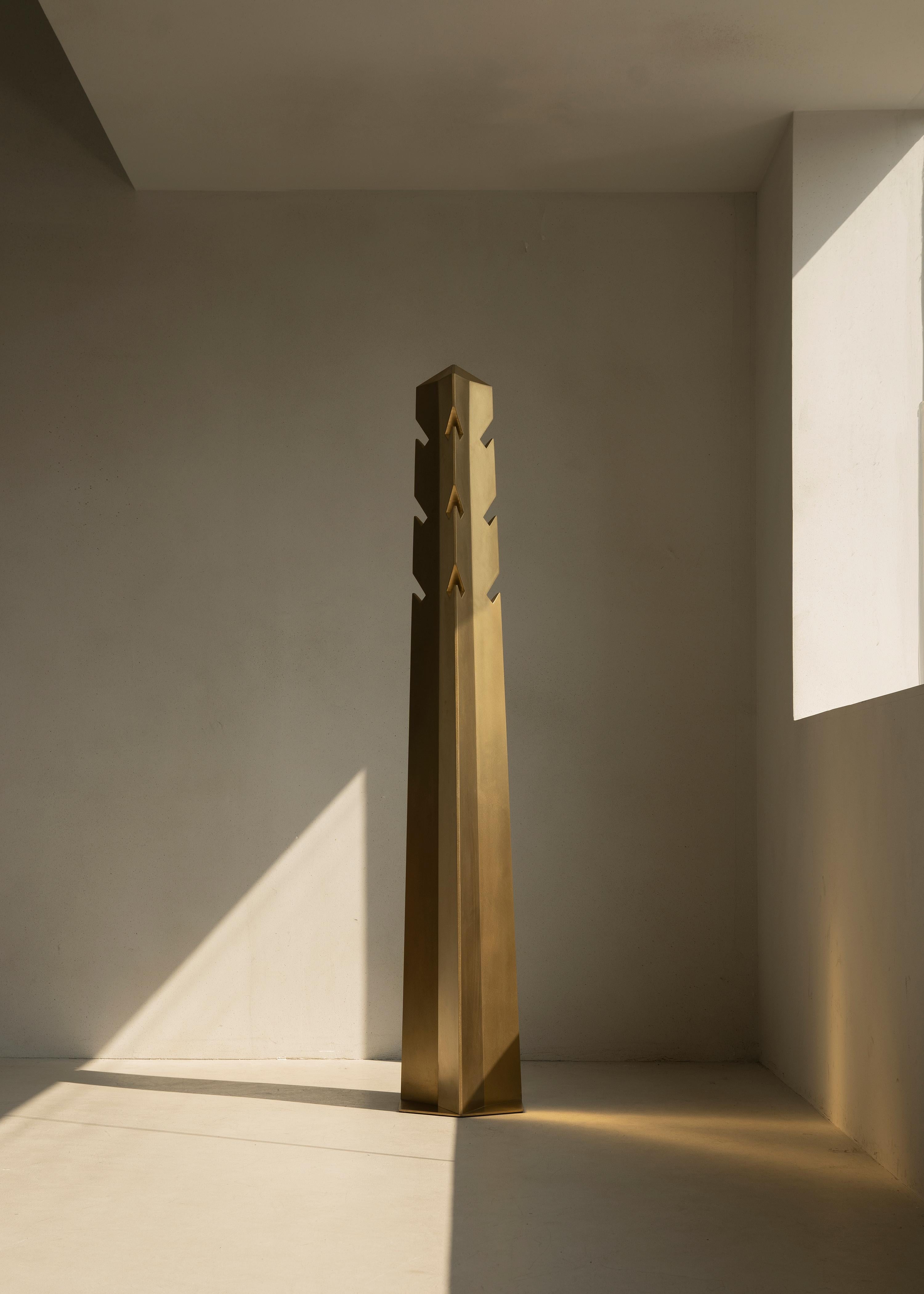 Obelisk 01 clothing stand by Sing Chan 
Dimensions: D 36 x H 190 cm
Materials: Stainless steel, electroplating.

Greek civilization and art were greatly influenced by ancient Egyptian culture, which radiated throughout the European continent. It can