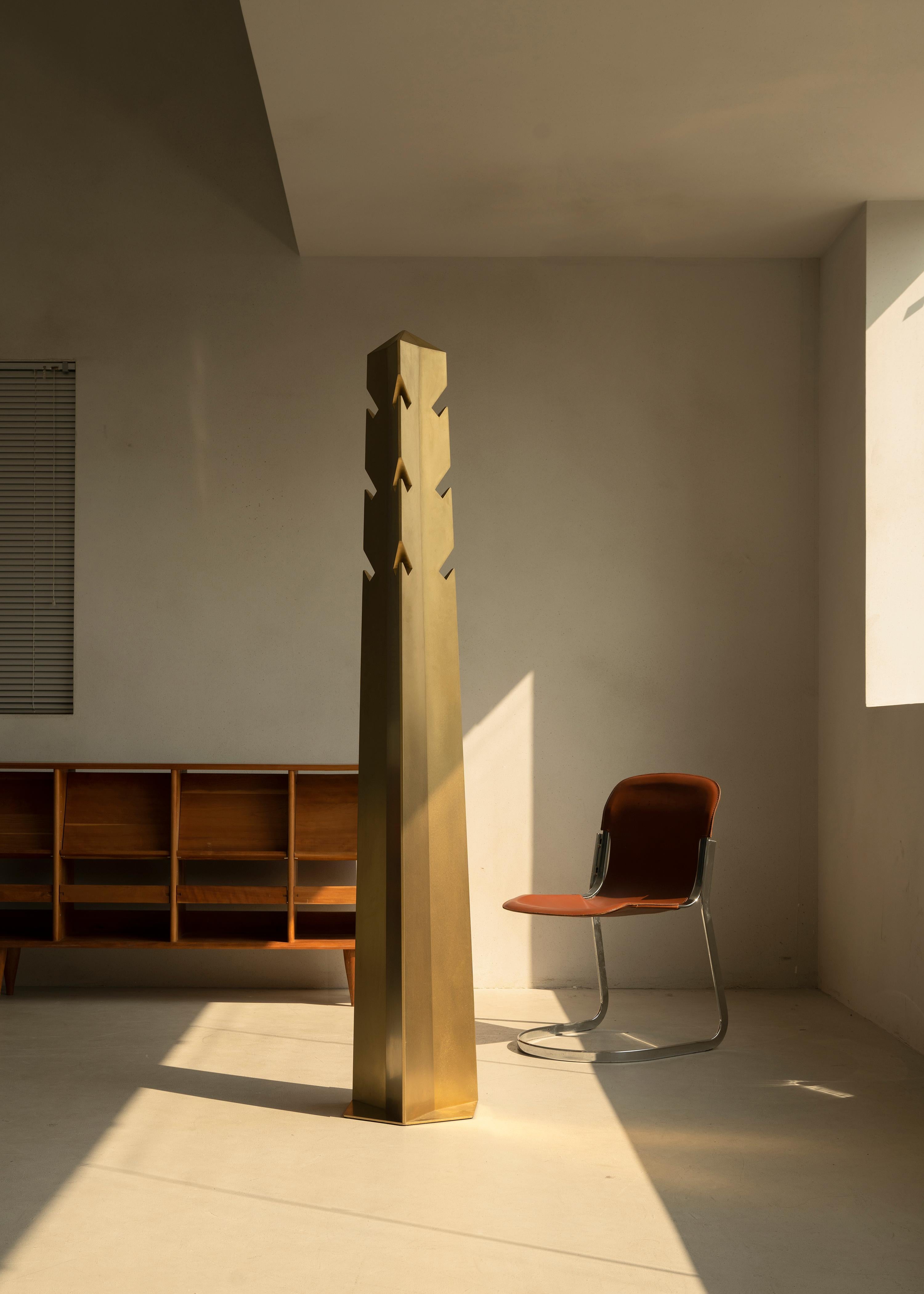 Dimension: L360 x W360 x H 1900mm.
Material: stainless steel.

Obelisk, a clothes stand, as well as an art installation for home, is inspired by the interaction between the obelisk and the sun in ancient Egyptian architecture. The sculptural
