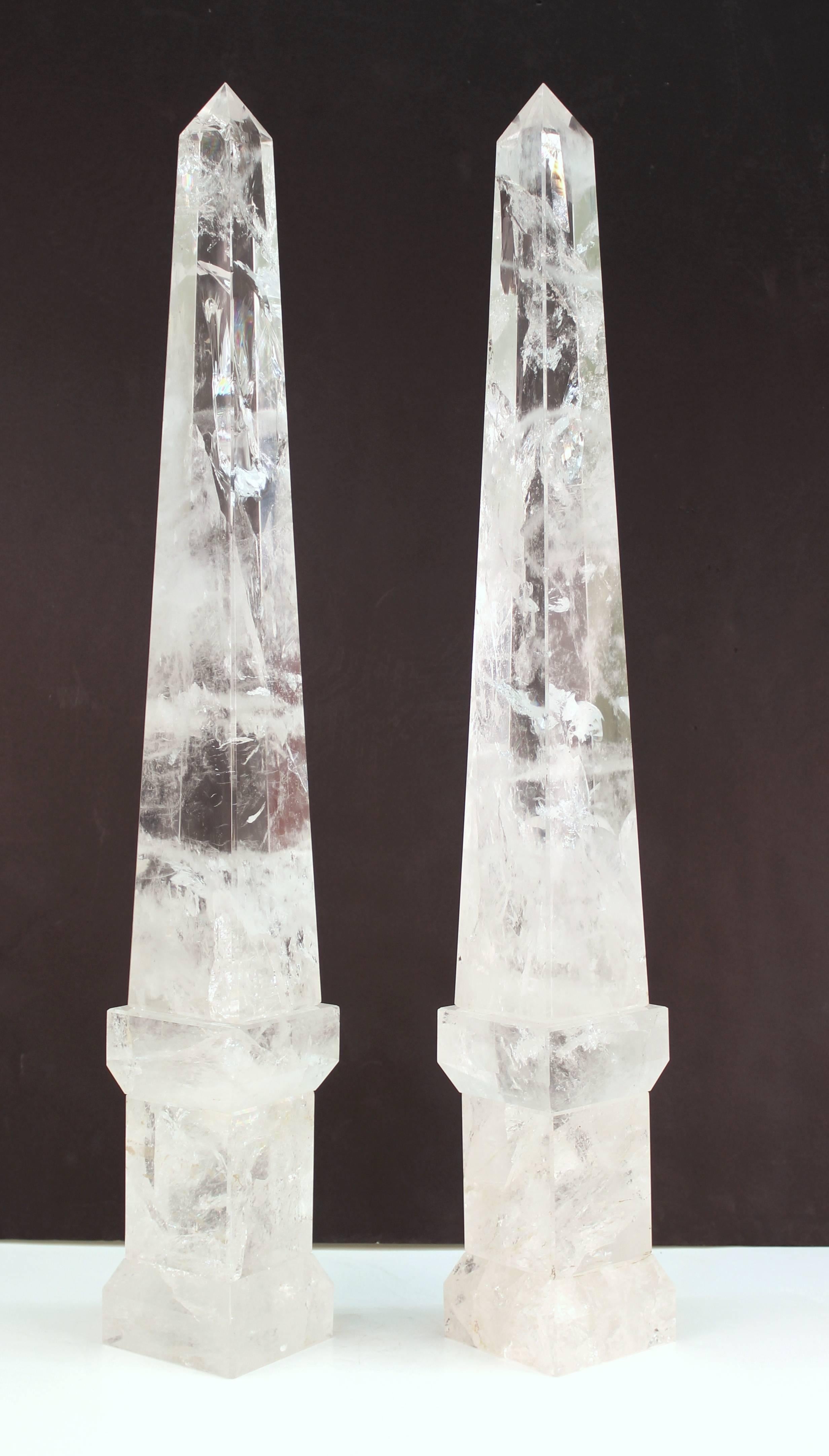 A pair of rock crystal obelisks in neoclassical form dating from circa 1980s. Each has been hand polished and is in excellent vintage condition with age appropriate wear. Dimensions listed are per item.
