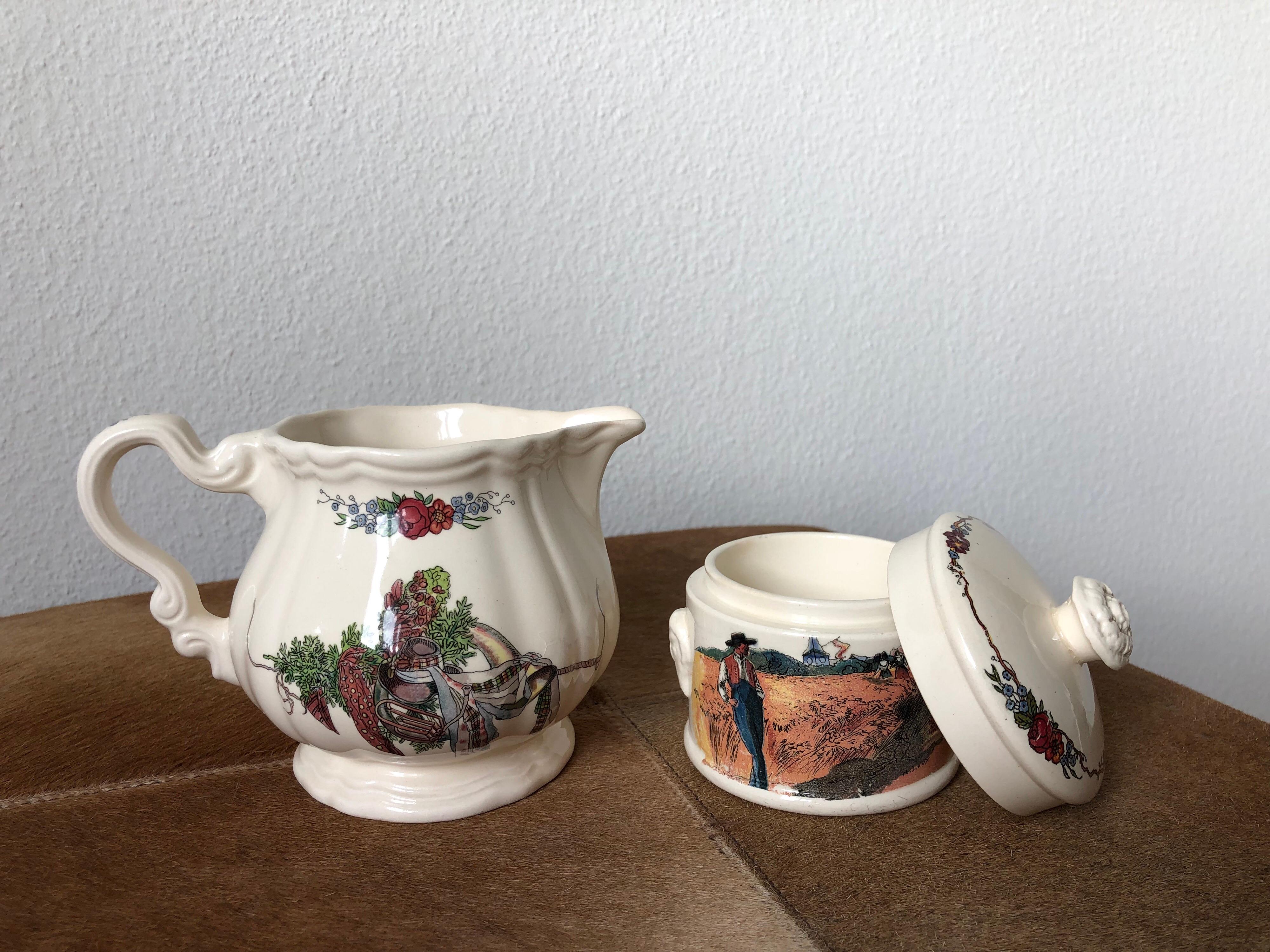 French vintage porcelain jars, French factory of Sarreguemines, France. Obernai collection, French kitchen, kitchen decor.

Sarreguemines is the name of a French town that is used as part of a china mark for Utzschneider and Company, a porcelain