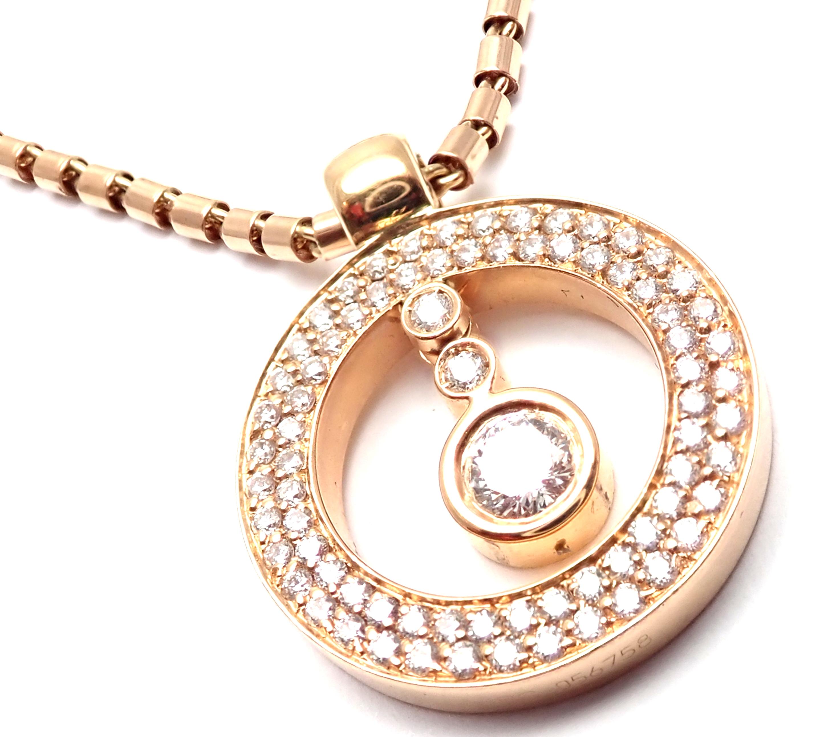 18k Rose Gold Cento Diamond Ruby Pendant Necklace by Roberto Coin. 
With 1Round brilliant cut diamonds total weight approx. .80ct
2 rubies
Details: 
Necklace: Length: 18