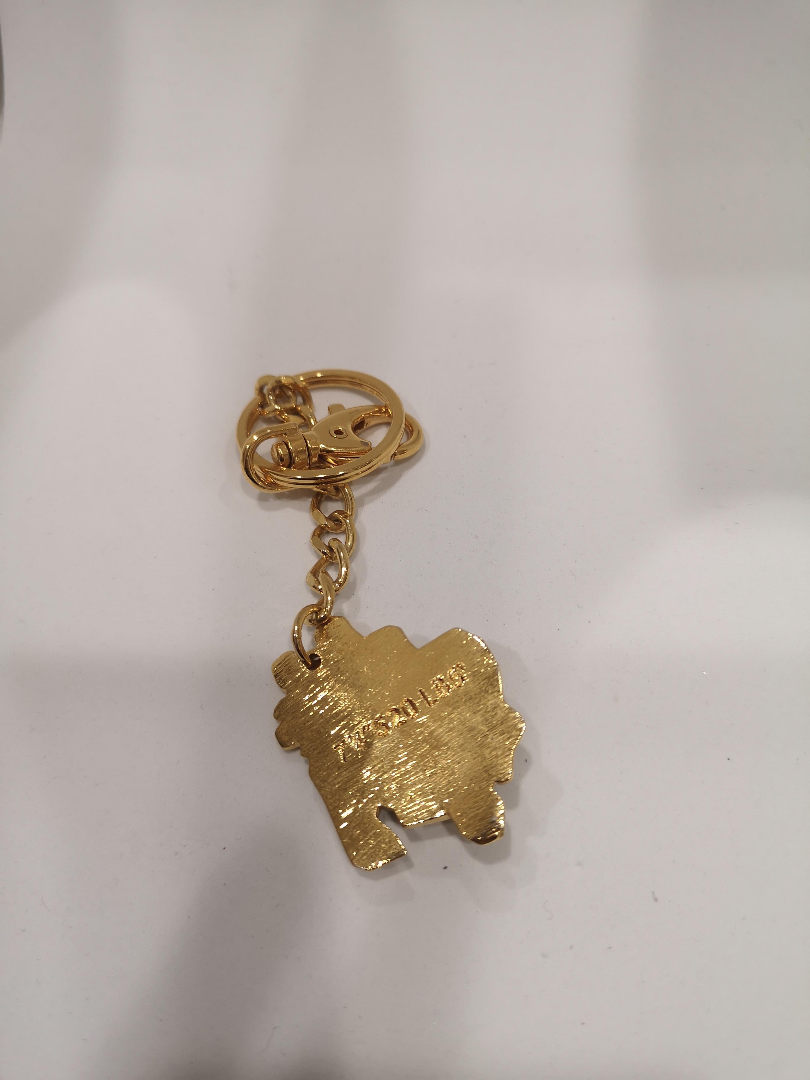 Obey gold tone key chain / accessories In Good Condition In Capri, IT