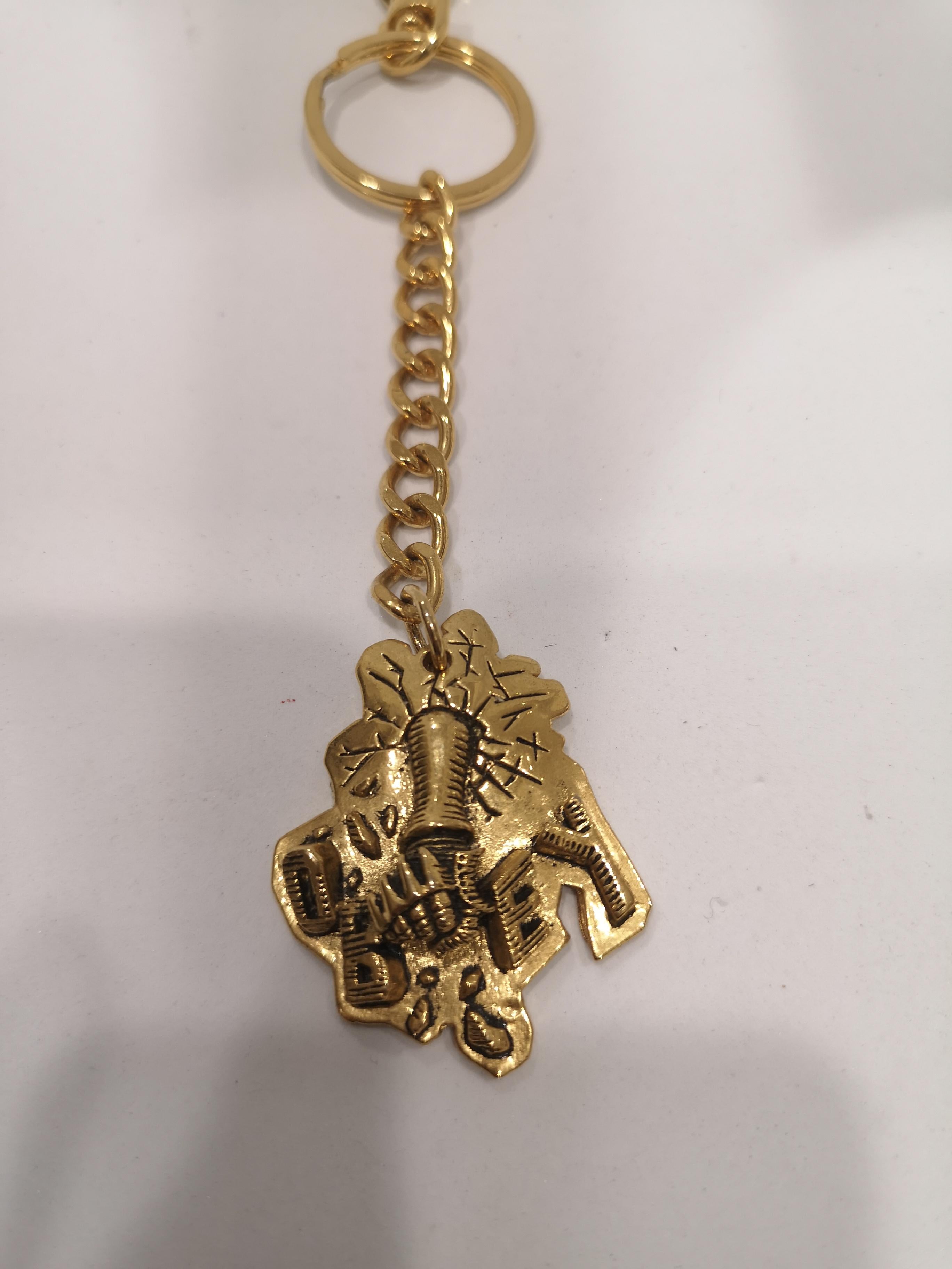 Obey gold tone key chain / accessories In New Condition In Capri, IT