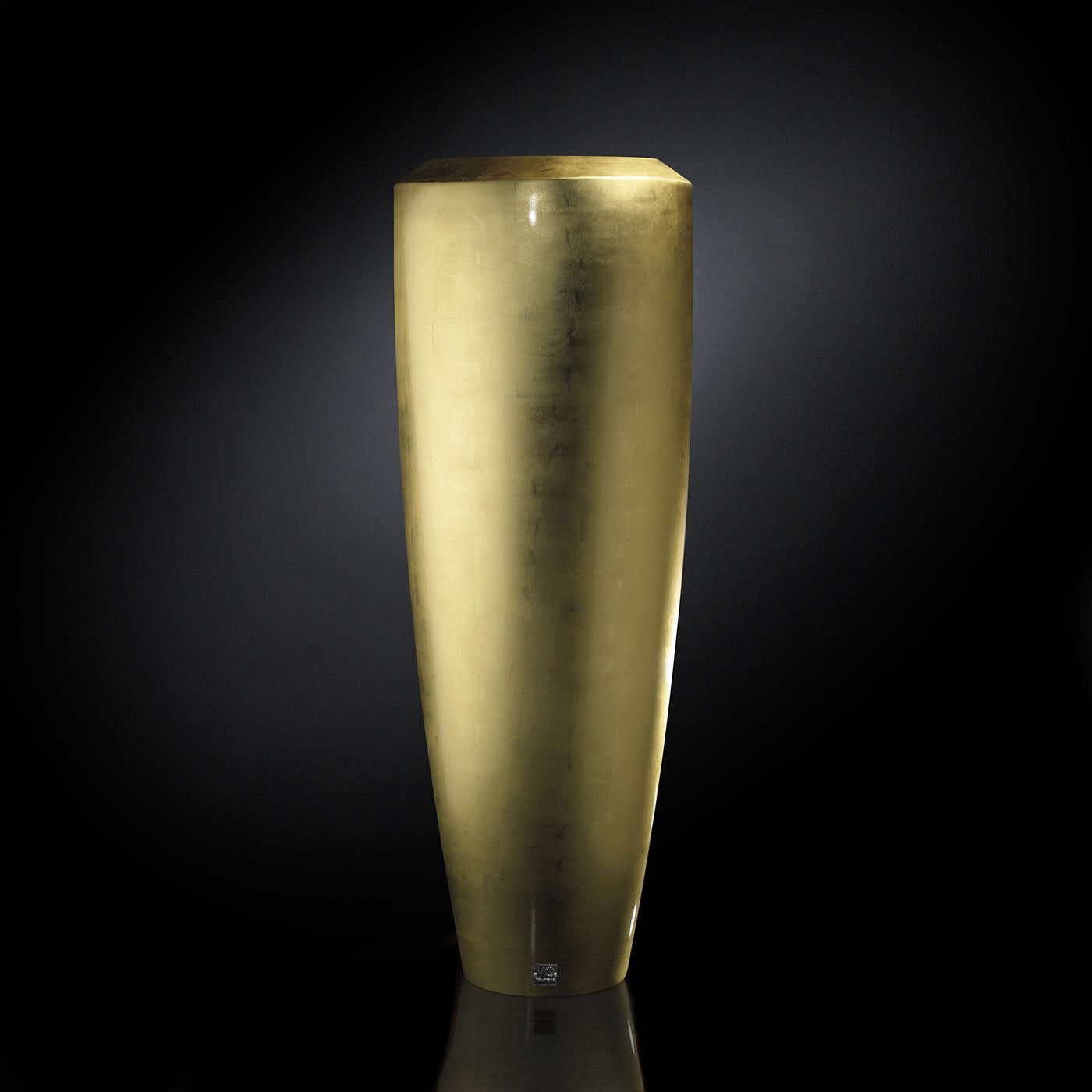 Marked by elegant golden hues, this opulent vase will add a refined accent to a contemporary interior. Crafted of LDPE (low-density polyethylene) enriched with gold leaf.
 