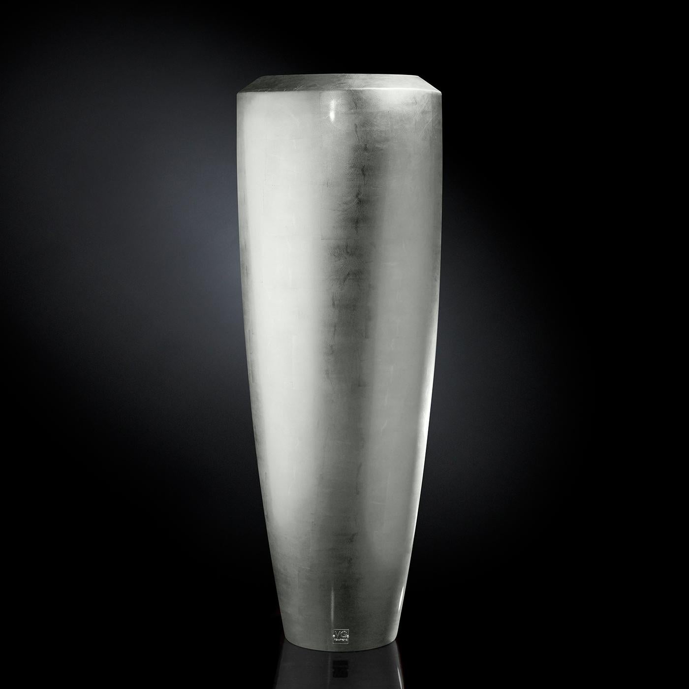 Part of the Obice Collection, this splendid vase will make a wonderful statement in a contemporary living room. Made of LDPE (low-density polyethylene), it is enriched with silver leaf.

