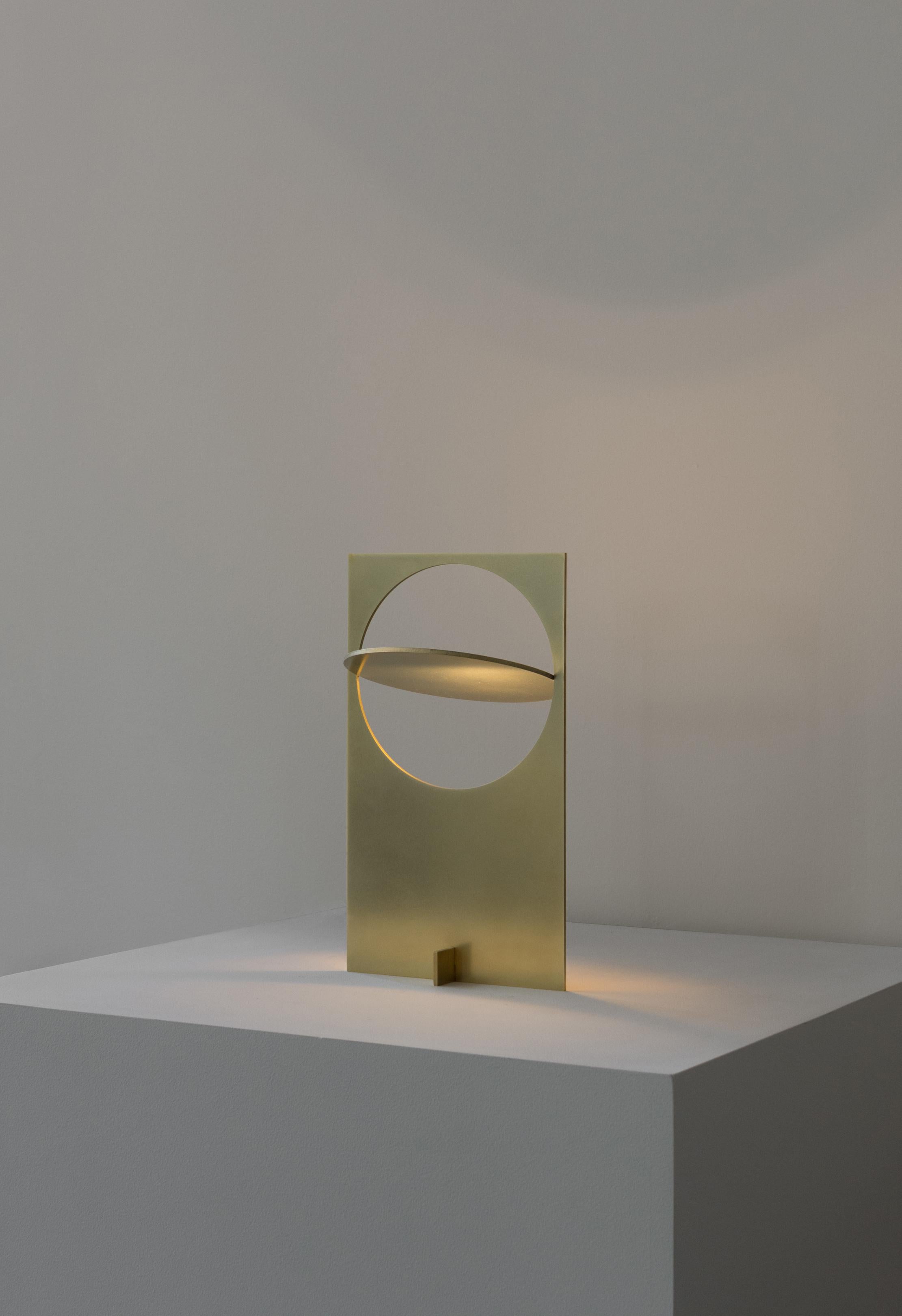OBJ-01 brass table lamp by Manu Bano
Dimensions: H 38 x W 22 x D 7 cm
Material: brass

All lamps are wired for the US, but voltage converter is available for other countries. 

OBJ-01 is an understandable simple gesture, an object that needs
