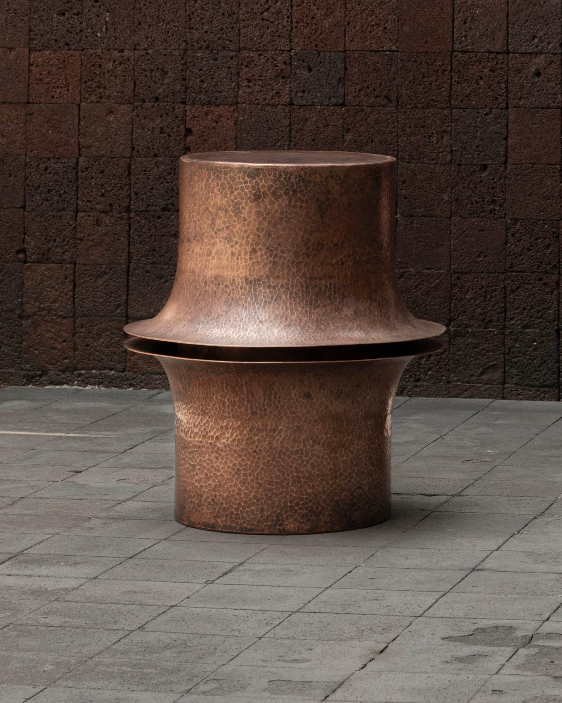 OBJ-06 B Copper Side Table by Manu Bano
Dimensions: D 45 x W 45 x H 50 cm.
Materials: Hammered copper.

This side table is available in three different shapes: A, B, and C. Please contact us. 

Manu Bañó was born in Valencia, Spain in 1990. After