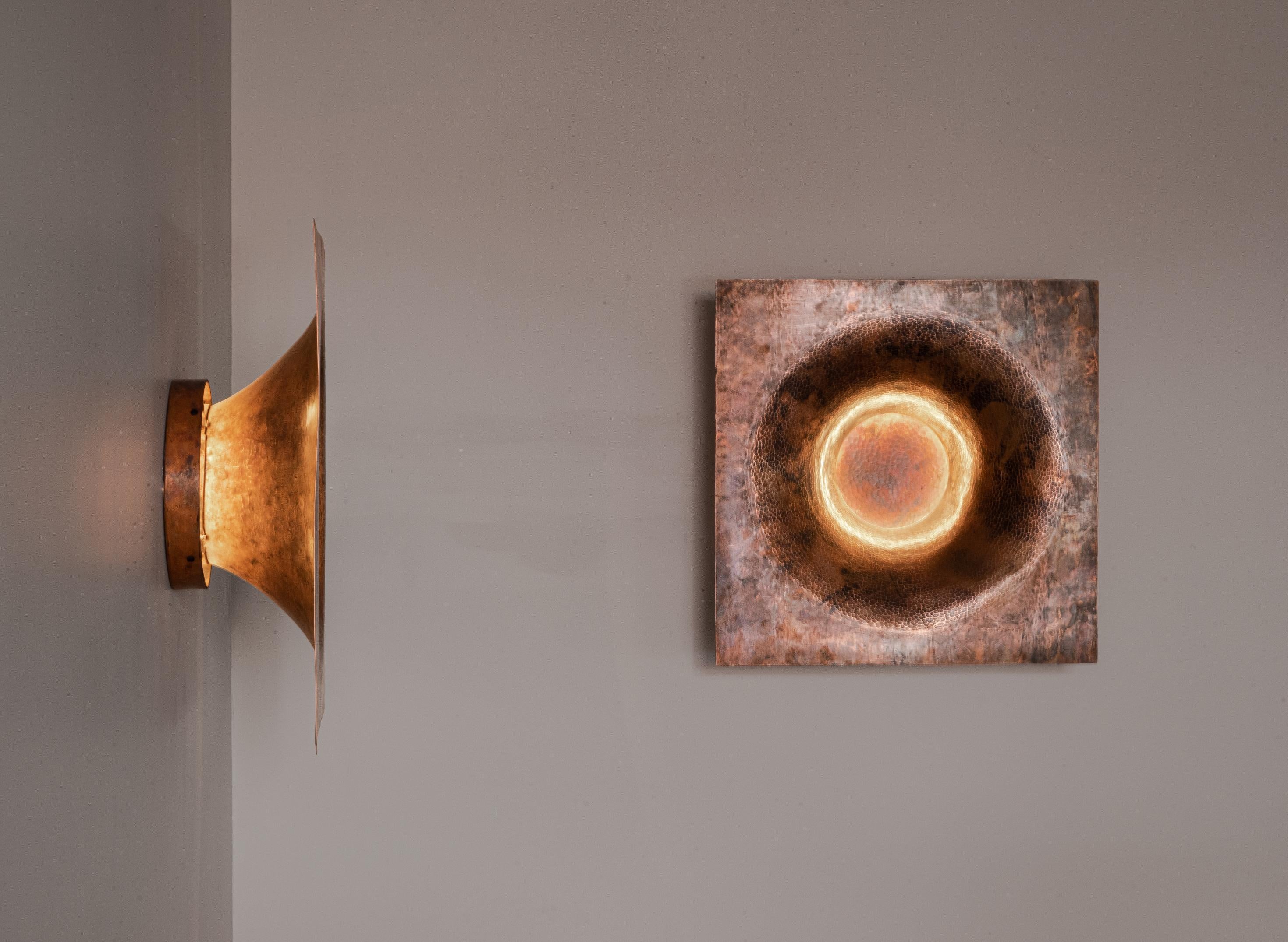 OBJ-07 copper wall lamp by Manu Bano
Dimensions: W 60 x D 60 x H 15 cm
Material: Copper

Manu Bañó's new collection explores the limits and properties of copper. It was produced in Santa Clara Del Cobre, Michoacán, a magical town with a long