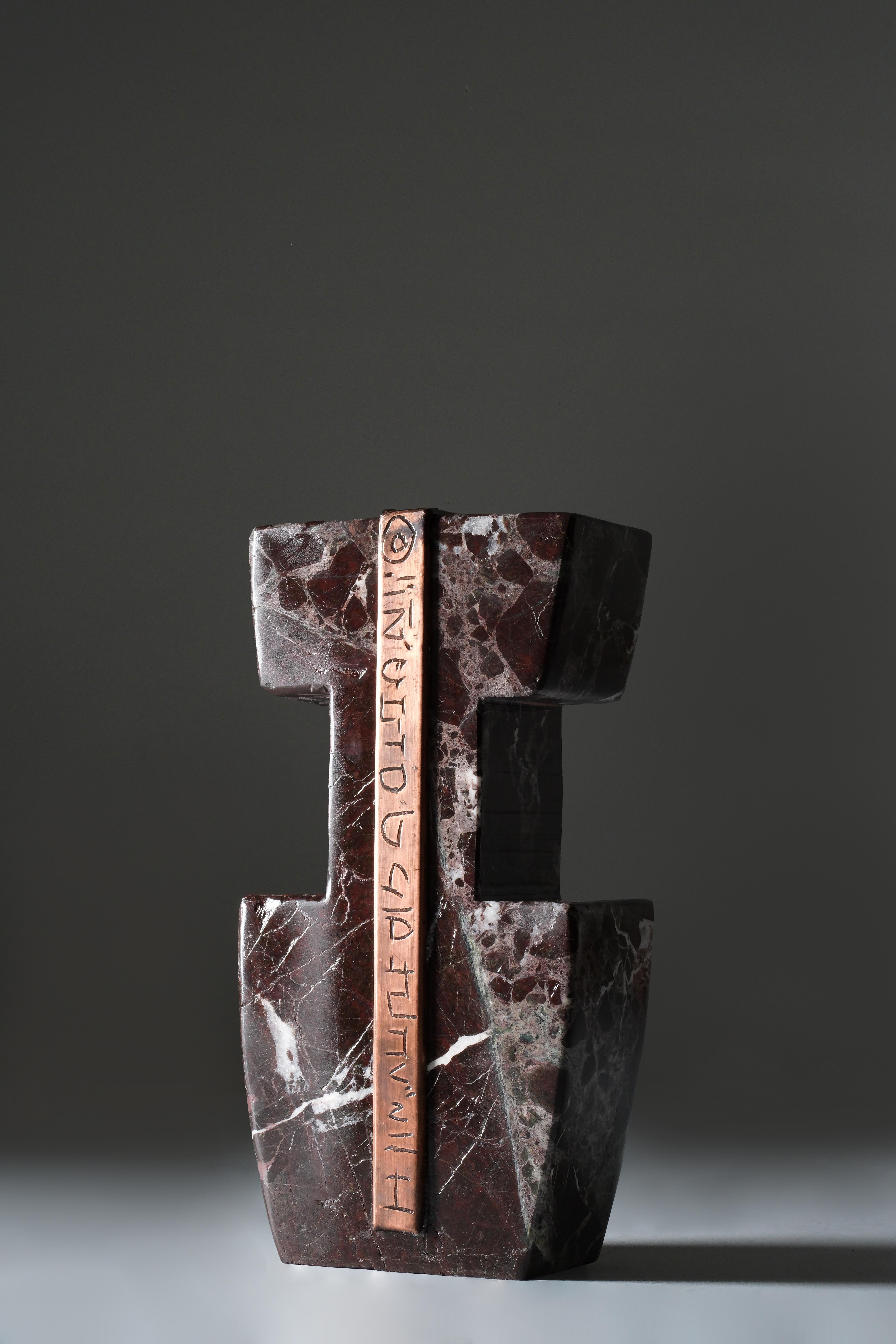 Object H by Ayse Zelal Tugrul
One of a Kind
Dimensions: D 7 x W 15 x H 30 cm.
Materials: Marble, copper.

The letter “H” symbolizes duality, life, death, and divinity, inspired by the ancient symbols of Göbeklitepe and similar representations found