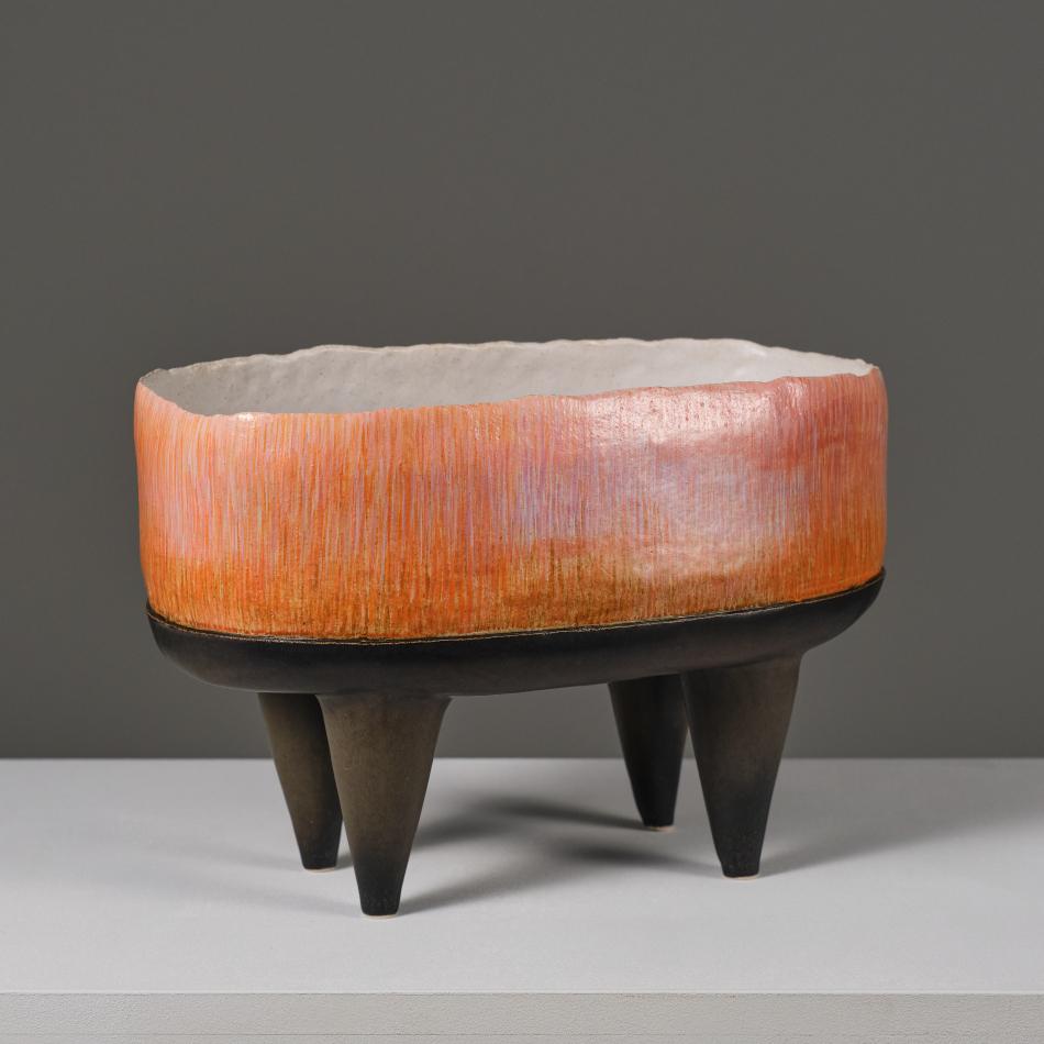 Working from ceramics as a broad discipline that includes design, sculpture and painting, this work belongs to a collection of objects in which the forceful volumetries dialogue with fragility, balance and color.

She has a degree on Ceramic and