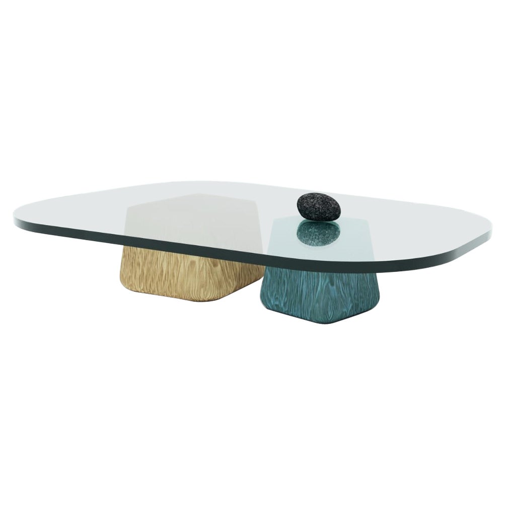 The Dovedale Stepping Stones are a beautiful feature in the Peak District and a declared National Nature Reserve of UK. With two different carved hardwood legs, the modern center table masterfully unifies the main characteristics from the