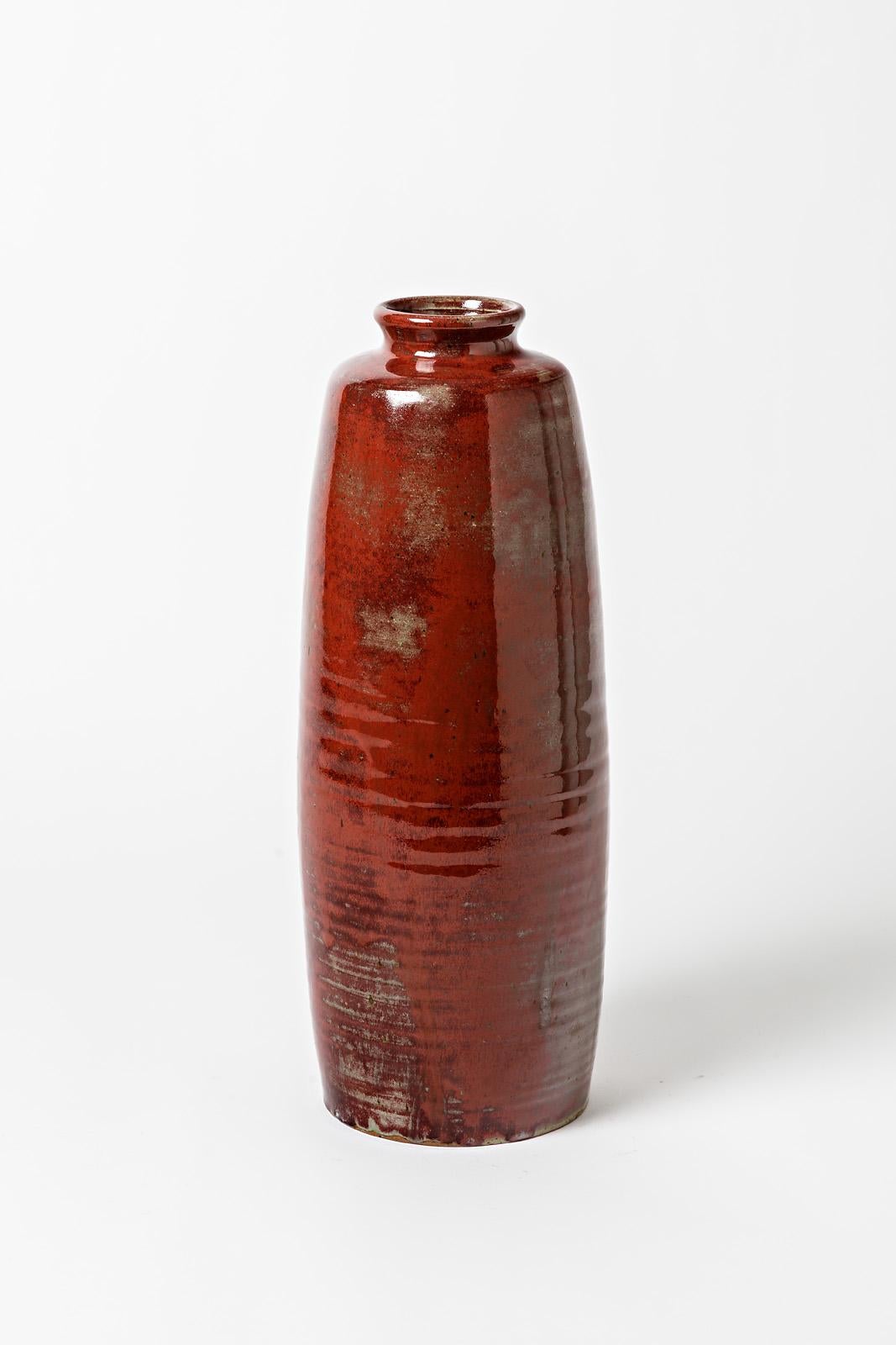 Oblong glazed stoneware vase with « oxblood red » by Roger Jacques.
Artist signature under the base « R.Jacques ». 
Circa 1960-1970.

H : 15.7’ x 5.11’ inches.