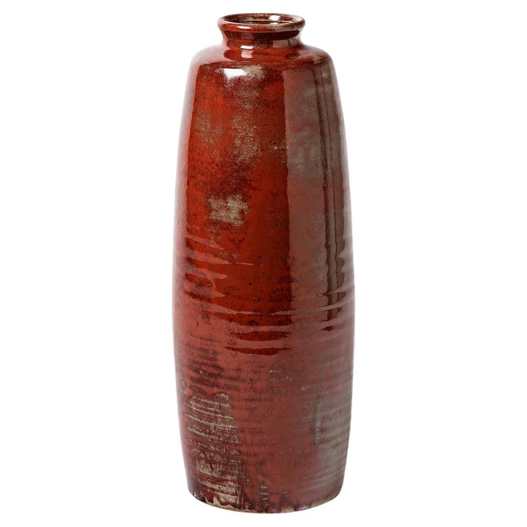 Oblong glazed stoneware vase with « oxblood red » by Roger Jacques For Sale