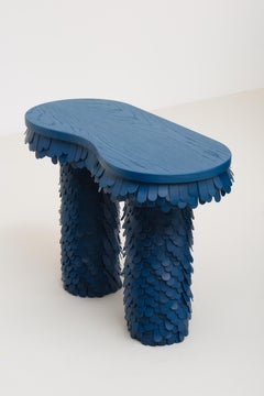 oblong textured organic blue leather and wood console