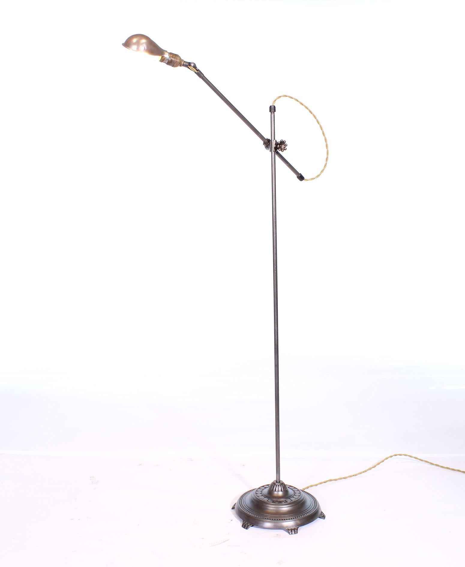 Industrial O.C. White Adjustable Floor Lamp with Claw Foot Base