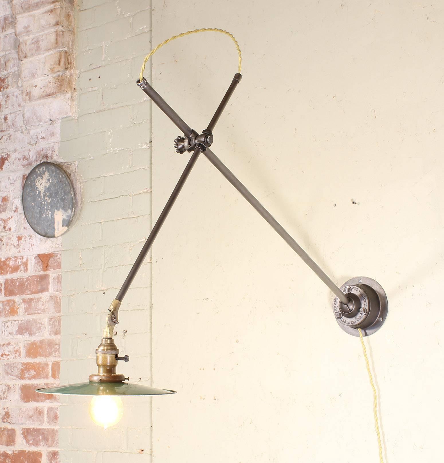 O.C. white adjustable ceiling pendant or wall sconce task lamp, light, cast iron fittings, ball and socket joint at ceiling affording adjustment through 60 degrees in all directions, universal 
