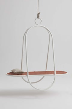 OCA, sedia a dondolo minimalista di Tiago Curioni in alluminio