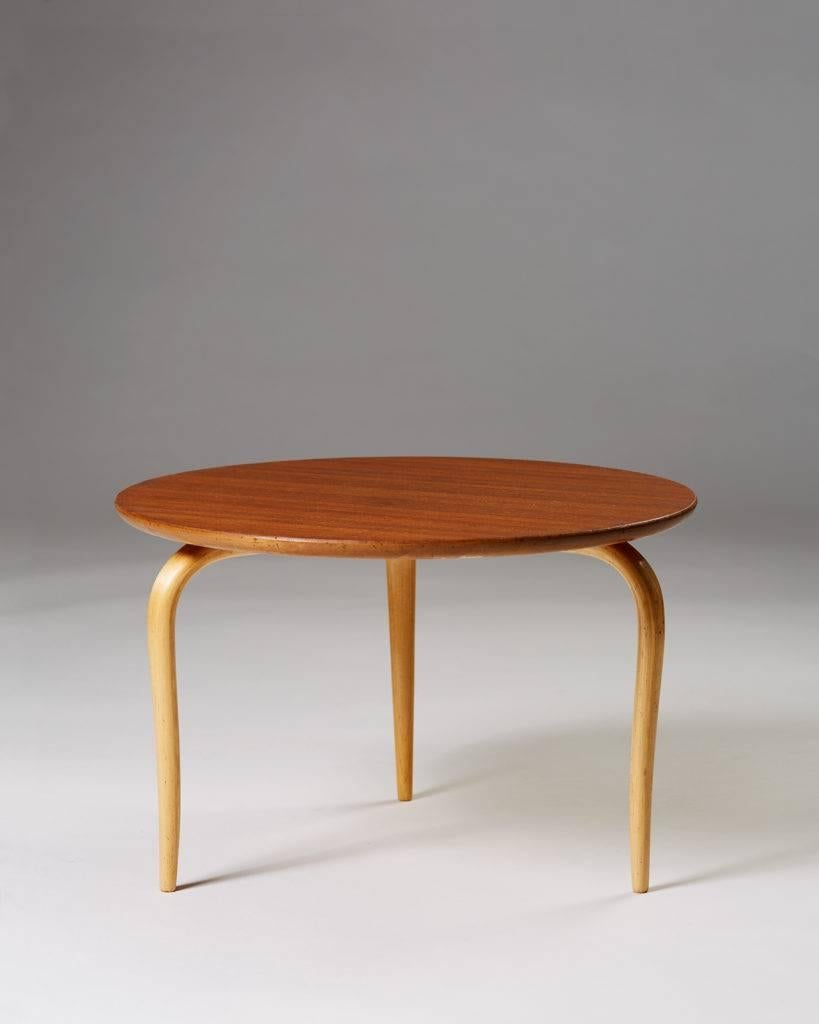 Occasional table “Annika” designed by Bruno Mathsson for Karl Mathsson, 
Sweden, 1950s.

Teak and birch.

Measure: H 28.5 cm/ 11 1/4