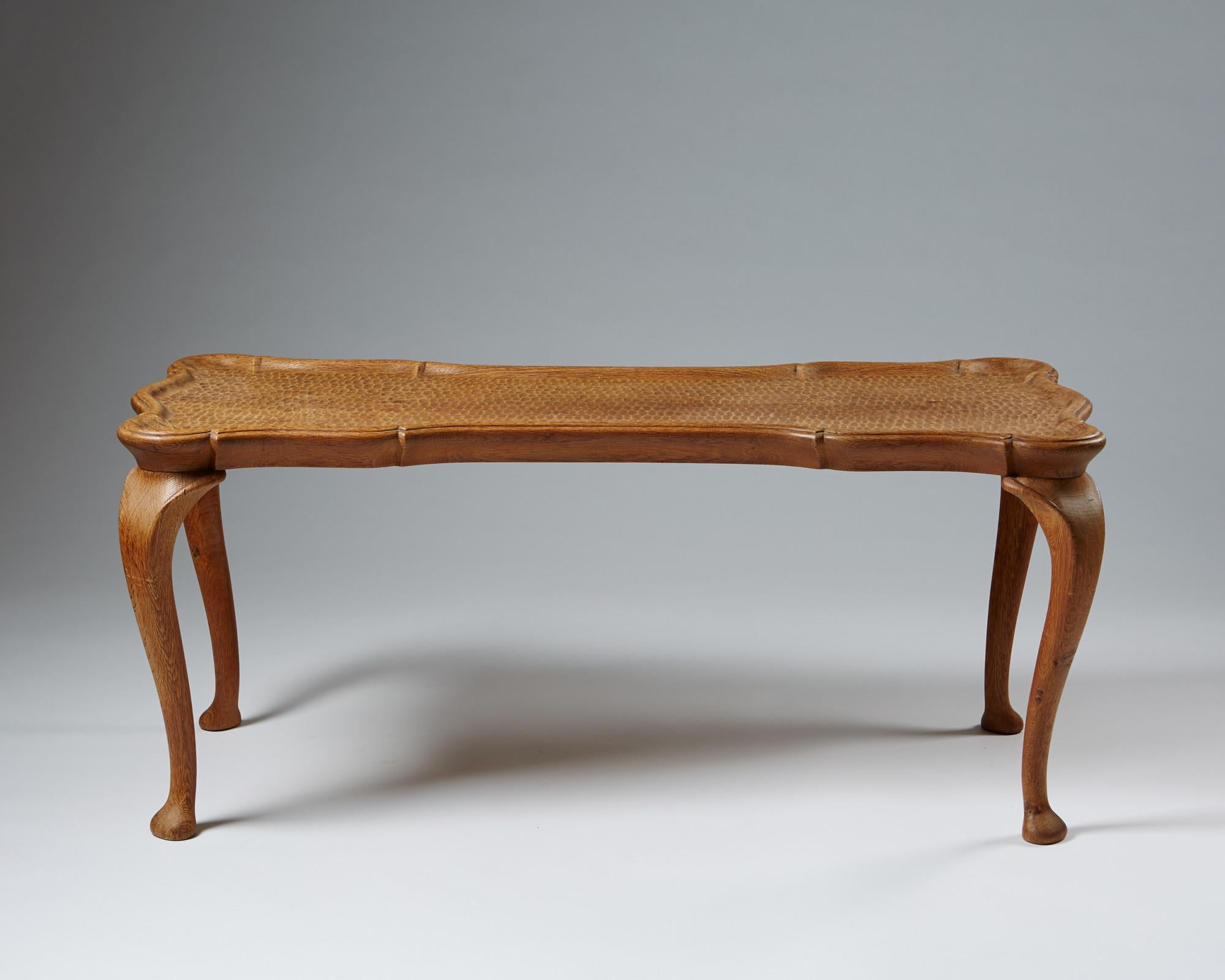 Occasional table attributed to Frits Henningsen,
Denmark 1940s.

Solid hand carved oak.

Measurements:
L: 140 cm / 4' 7''
D: 53 cm / 21''
H: 53 cm / 21''
 