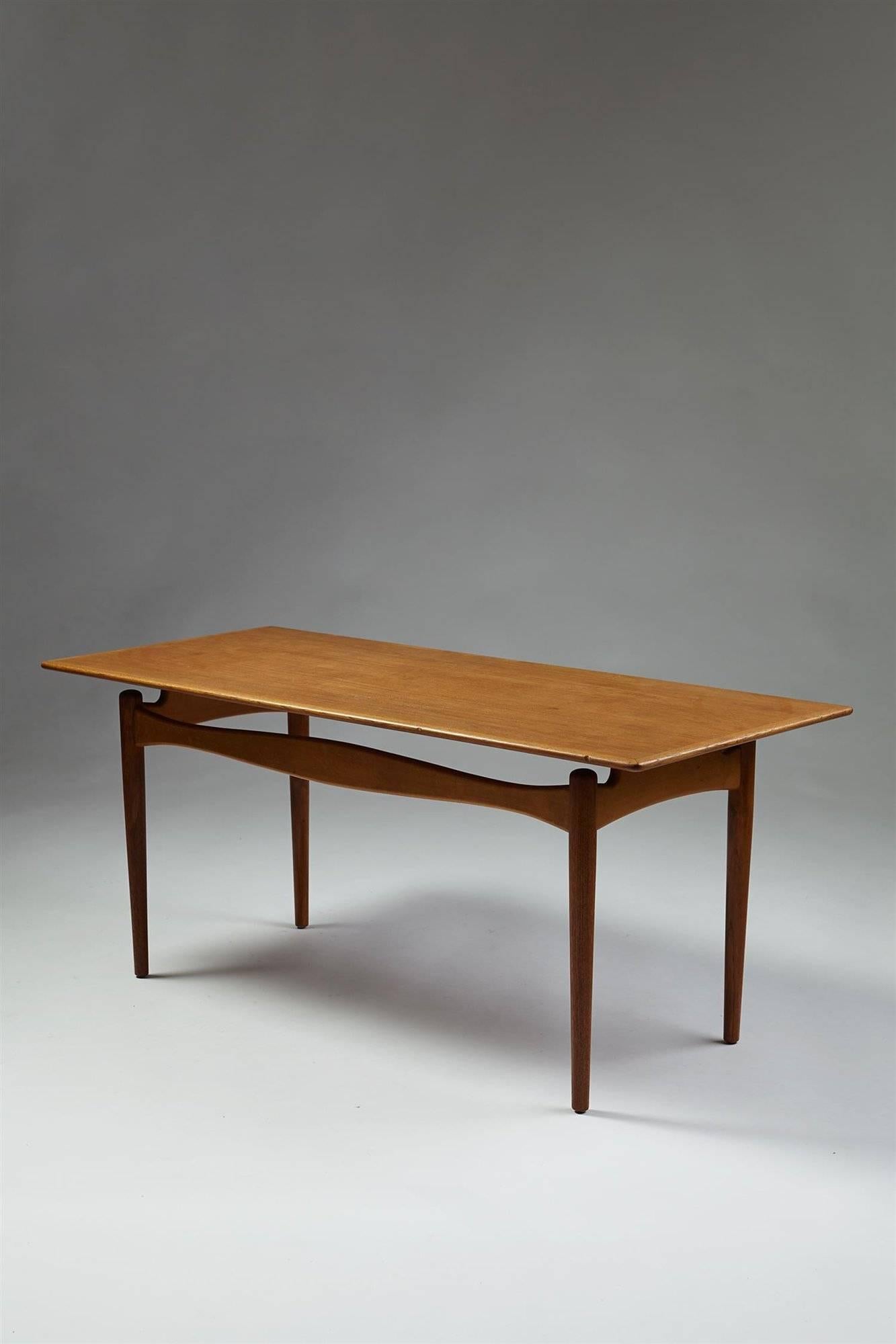 Occasional table designed by Finn Juhl for Bovirke,
Denmark, 1950s.

Teak and beech.