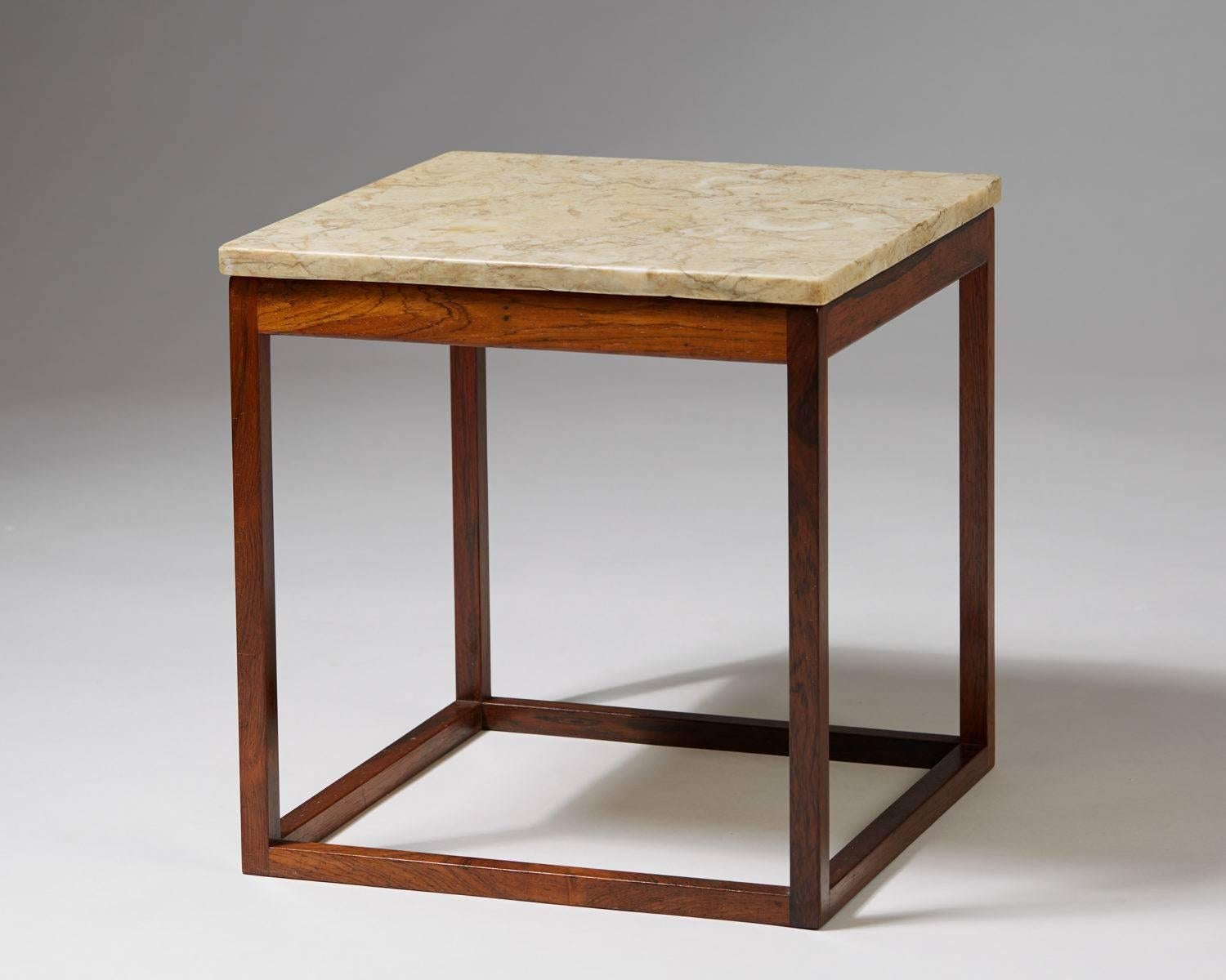 Occasional table designed by Kurt Östervig for K. P. Möbler,
Denmark, 1960s.

Rosewood and marble.