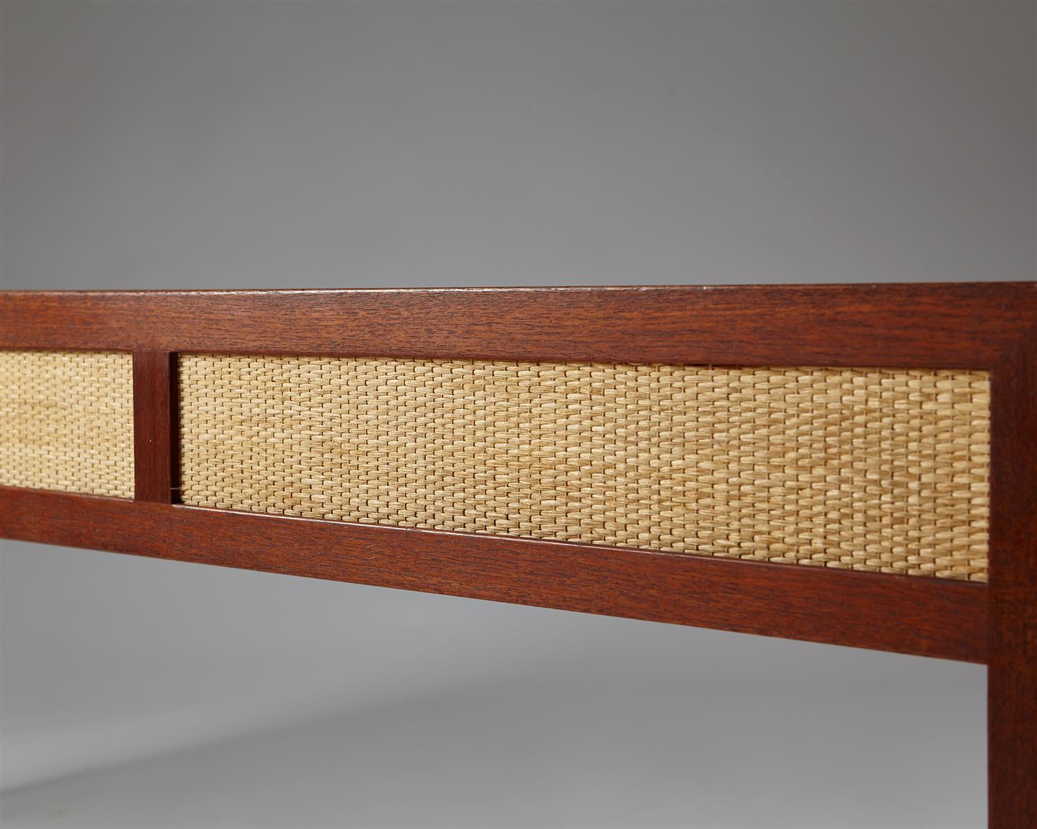 Occasional table designed by Mogens Lassen for T. Madsen, 
Denmark, 1953.
Teak, rosewood and hessian.