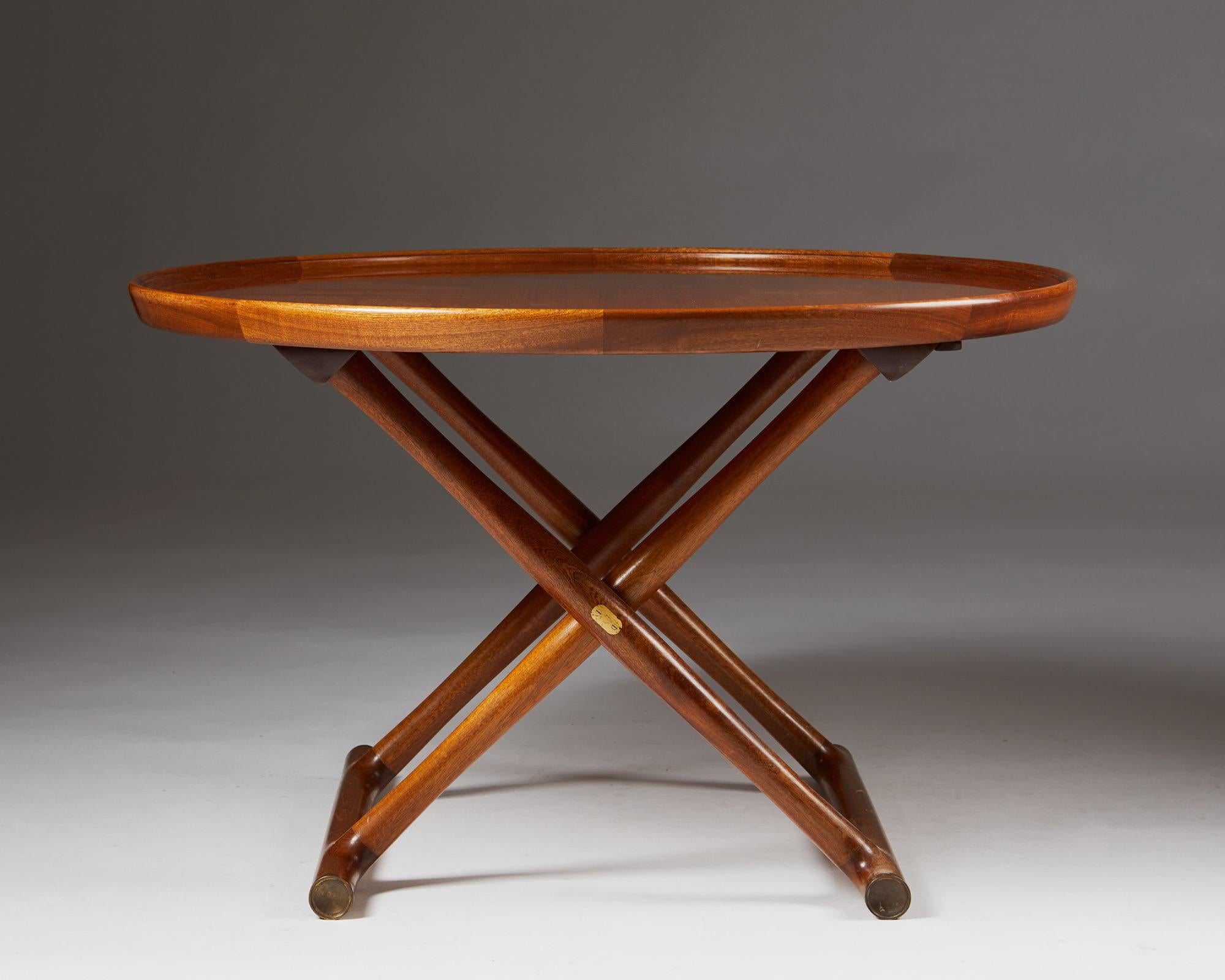 Occasional table “Egyptian Table” designed by Mogens Lassen, Denmark, 1940s. Mahogany and brass.