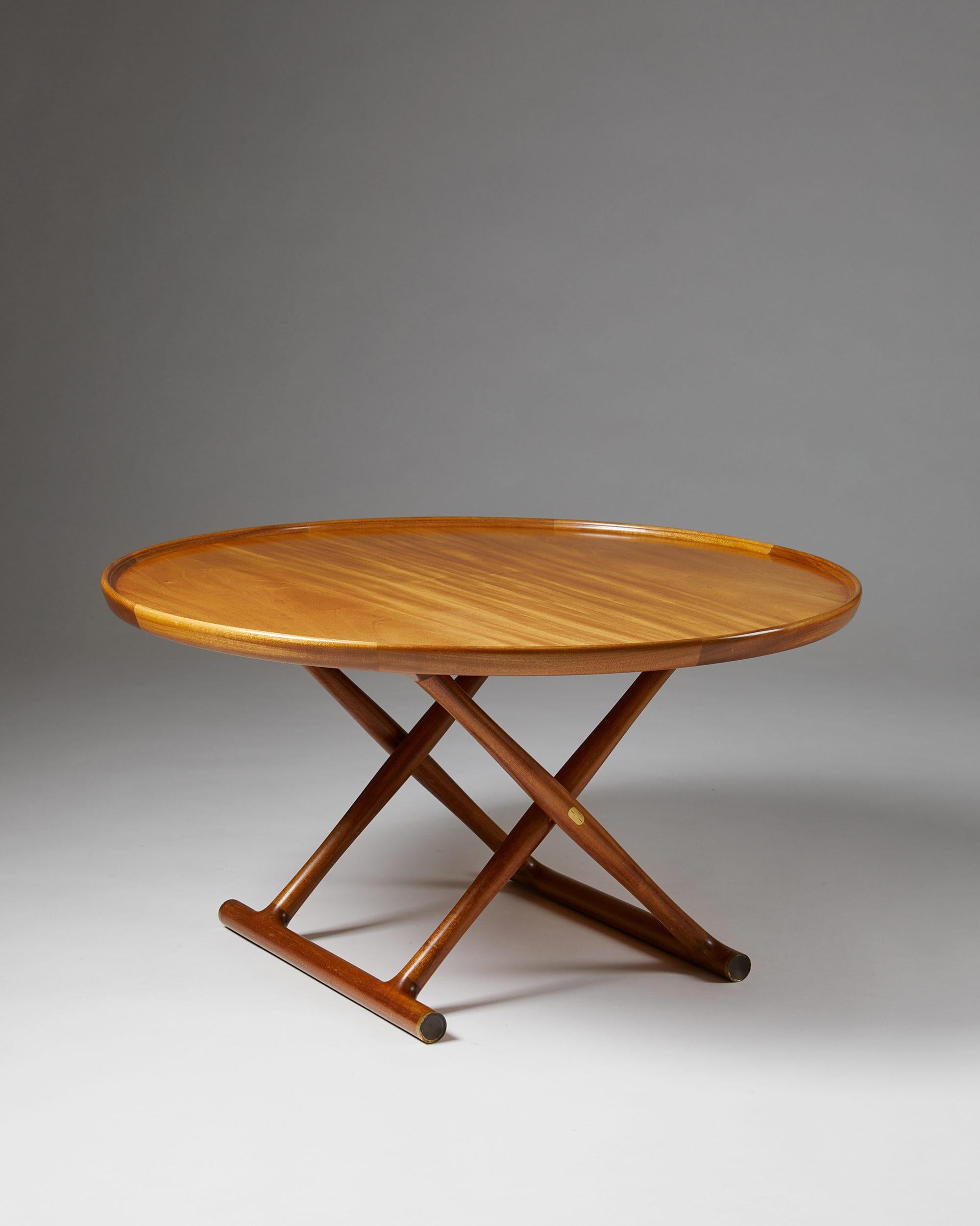 Occasional table “Egyptian Table” designed by Mogens Lassen, Denmark, 1940s. Mahogany and brass.