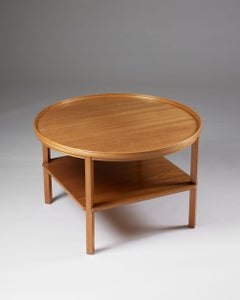 Mesa auxiliar modelo 6687 diseñada por Kaare Klint para Rud. Rasmussen Dinamarca