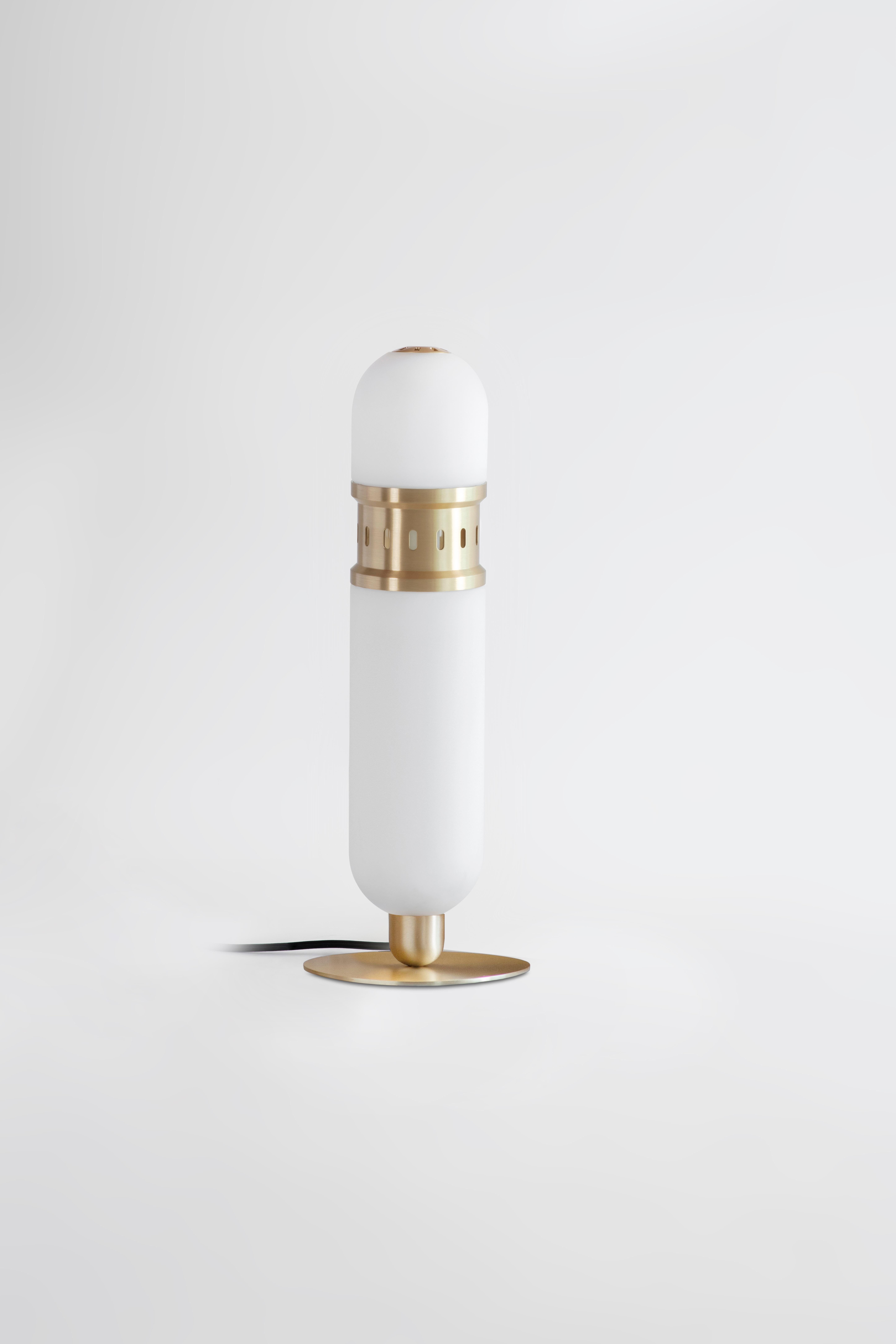 Occulo brass table lamp I by Bert Frank.
Dimensions: 15 x H 46 cm.
Materials: brass, glass.
Available in brushed brass, dark bronze or satin nickel.

All our lamps can be wired according to each country. If sold to the USA it will be wired for