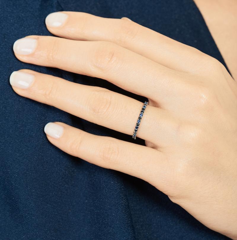Our Ocean Blue eternity ring features blue and navy sapphires with black diamonds for subtle multidimensional sparkle, all set in black rhodium-plated 14k white gold. 

25% of all proceeds to go Oceana, a non-profit dedicated to exploring and