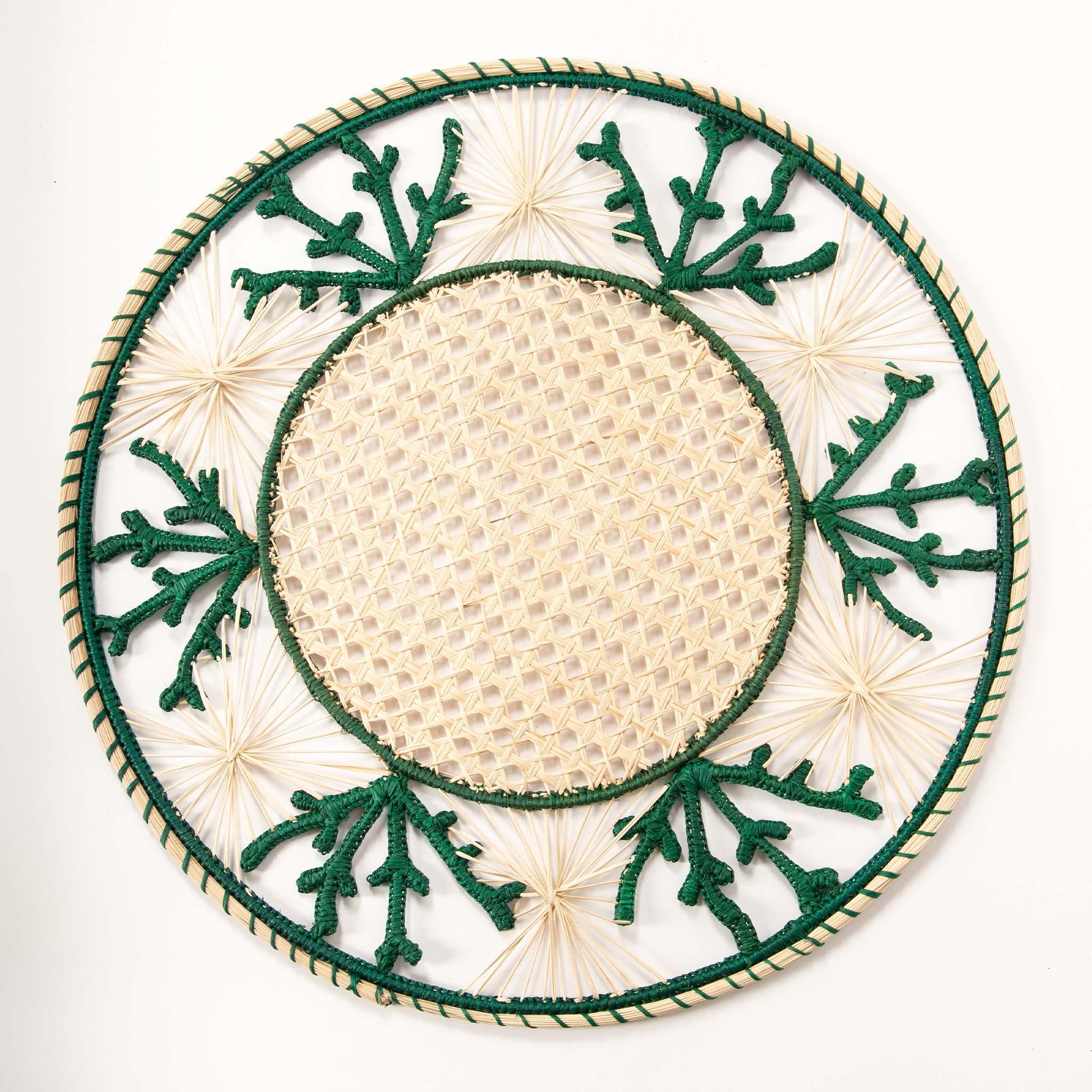 Elevate your table setting with this stunning set of six Creel and Gow Iraca fiber placemats, handwoven in Colombia. Featuring an intricate coral-inspired design in vibrant forest green, these placemats measure 15.5” in diameter and blend natural
