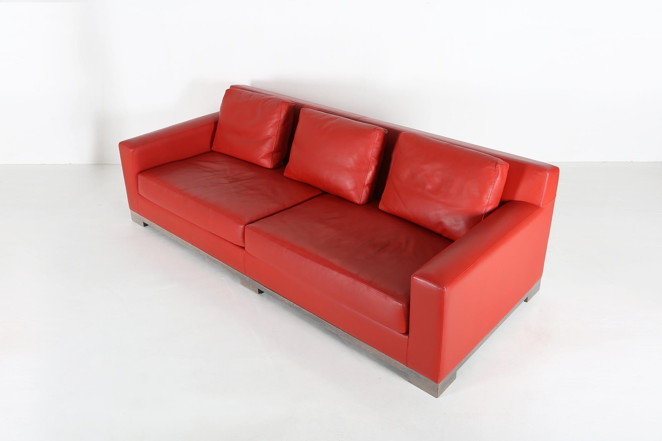 Sofa model Océan by French designer Christian Liaigre 1999.
High quality sofa made of oak wood and red leather.