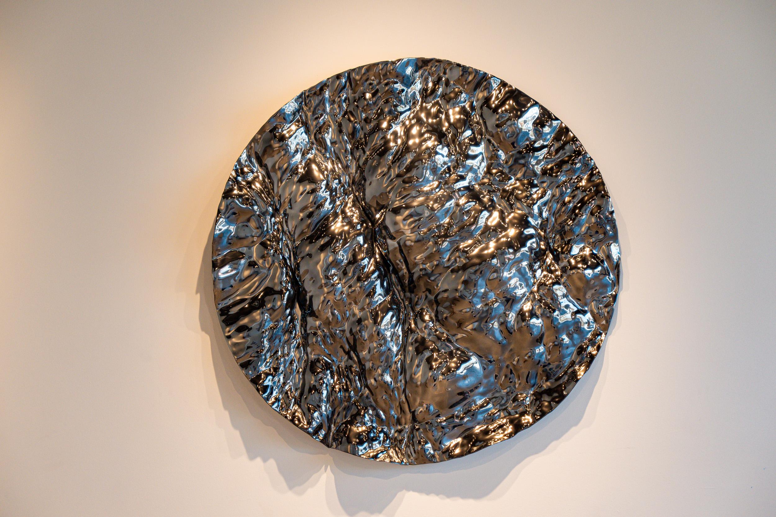 The Oceana Panel from the Oceana Collection by Katz Studio is an artistic homage to the rhythmic cadences of the sea. This wall-mounted tableau captures the essence of converging ocean frequencies, its surface a symphony of crests and troughs that