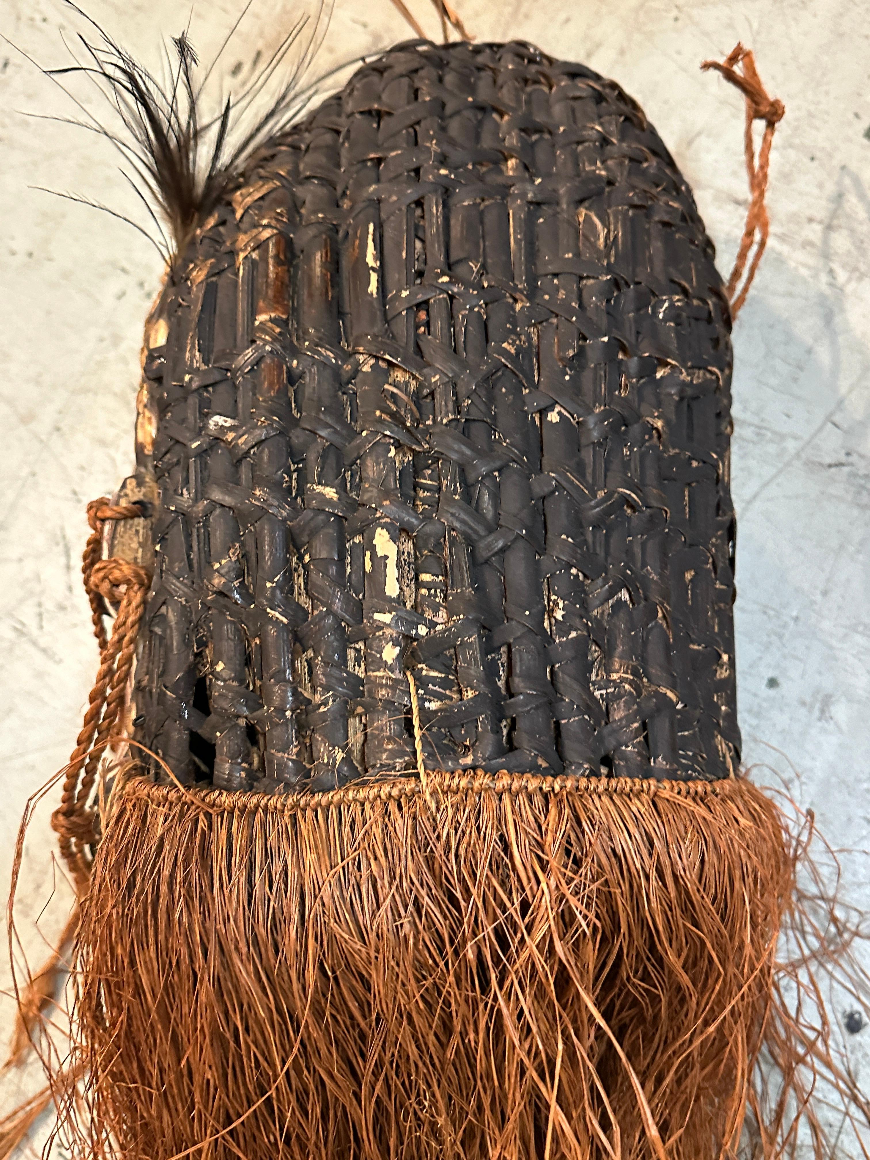 20ième siècle Masque océanique en bambou avec de longs cheveux de Nouvelle-Guinée en vente
