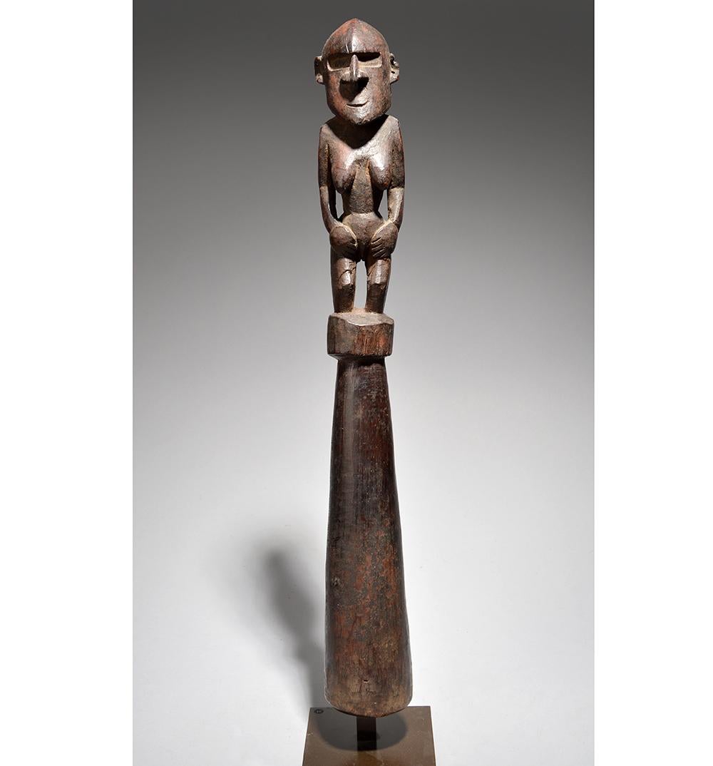 Oceanic Schouten islands Pounder Papua New Guinea

A Fine old hard wood Pounder or pestle with a standing female figure from the schouten islands off the north coast of Papua new Guinea 

Condition Age use old cracks were fig joins pestle generally