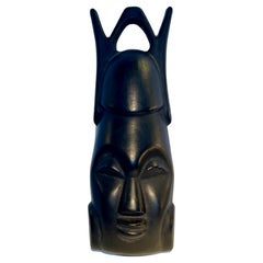 Oceanic tribal black patinated mask in the tatse of Roger Capron, Circa 1960