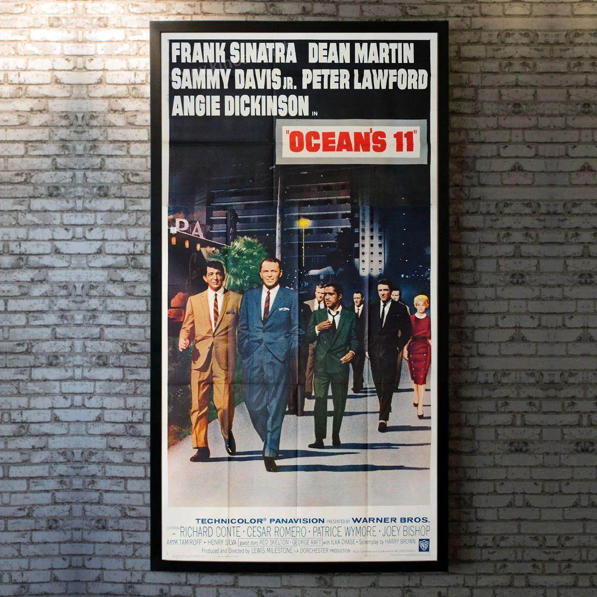 Ocean's 11 / Ocean's Eleven, Unframed Poster, 1960

Three Sheet (41 X 81 Inches). Best poster on the Las Vegas heist gambling crime classic featuring 'The Rat Pack'. Danny Ocean gathers a group of his World War II compatriots to pull off the