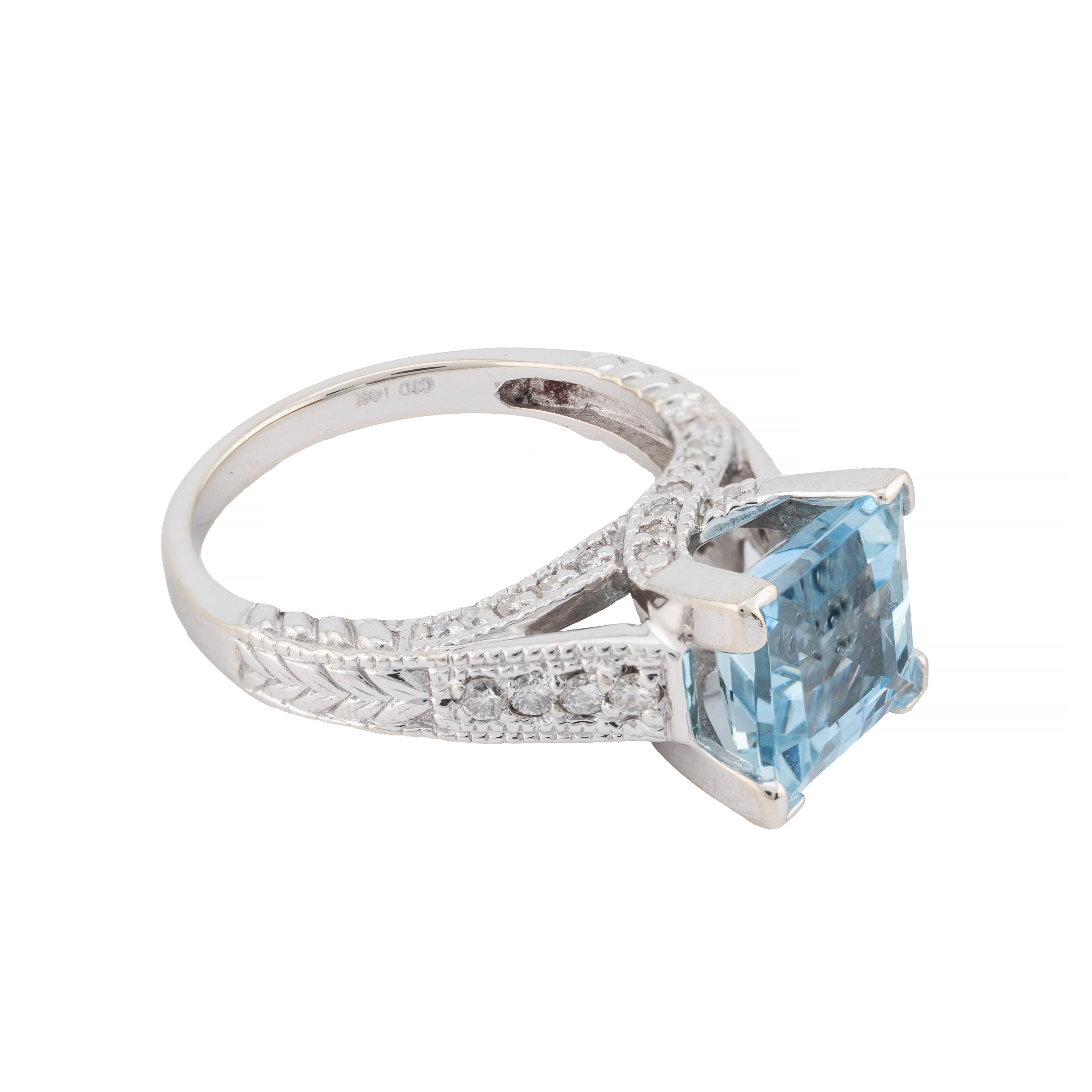 Aston Estate Jewelry Presents:

A striking statement ring featuring a 3.0-carat aquamarine. The Asscher cut of the aquamarine highlights its vibrant blue hue, creating a stunning centerpiece. The stone is set in a 14k white gold band, adorned with