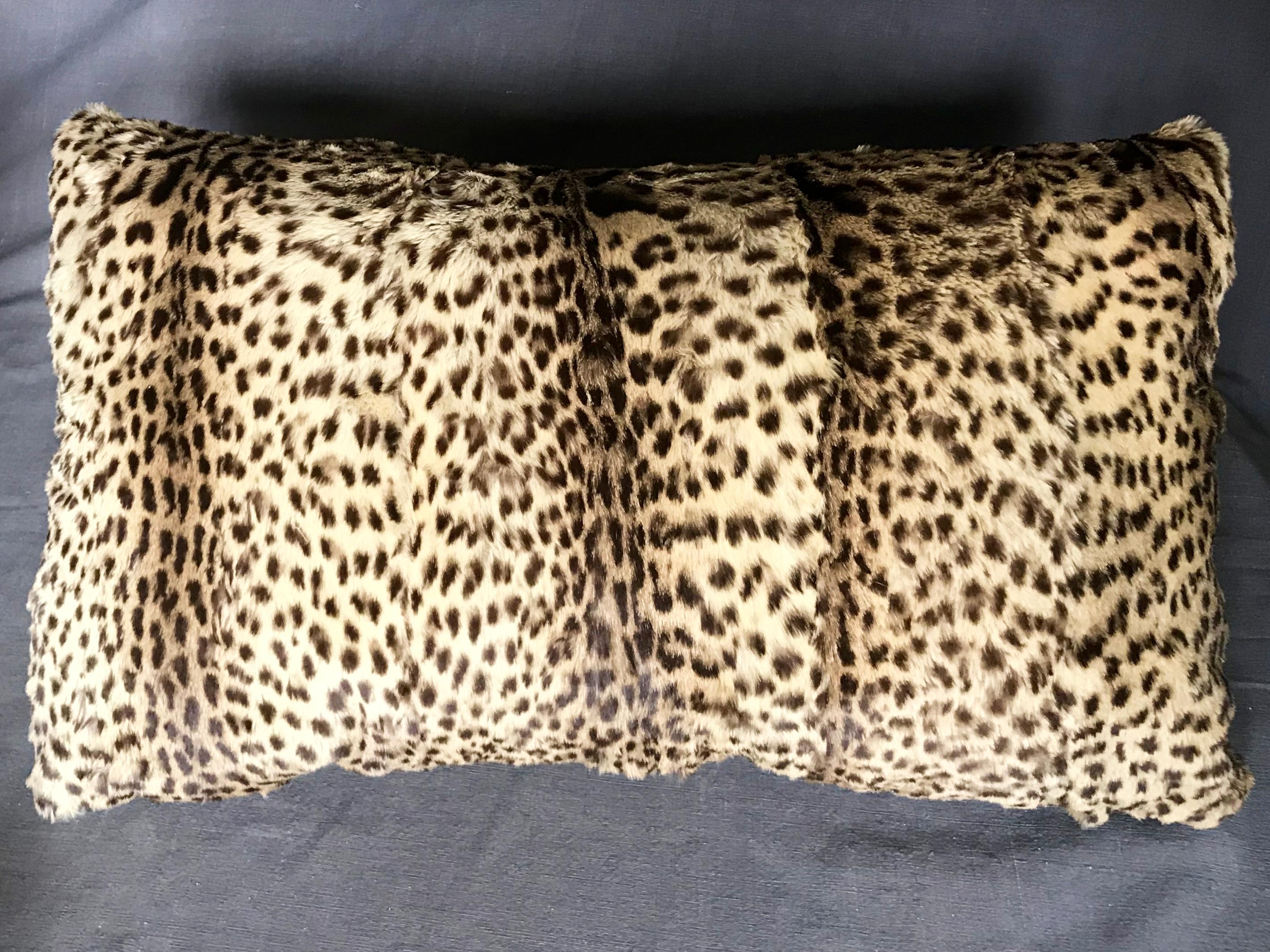 Ocelot and Fortuny silk velvet pillow. Luxurious real vintage ocelot and brown Fortuny silk velvet down and feather pillow.
Similar to cheetah in pattern, this ocelot pelt has a subtler, quieter feel, but equally exotic and rich in effect. United