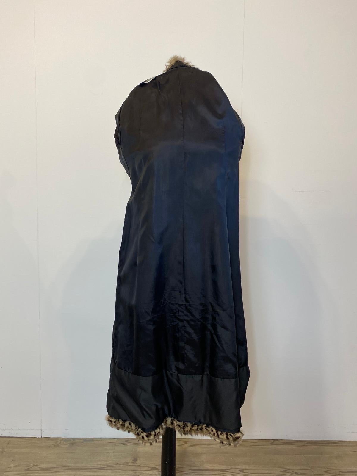 Women's or Men's Ocelot fur with leather details. For Sale