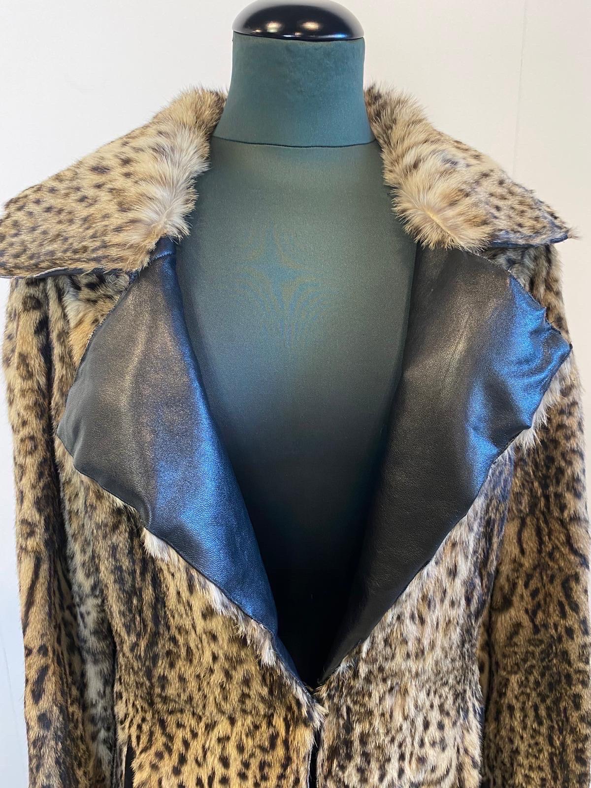 Ocelot fur with leather details. For Sale 2