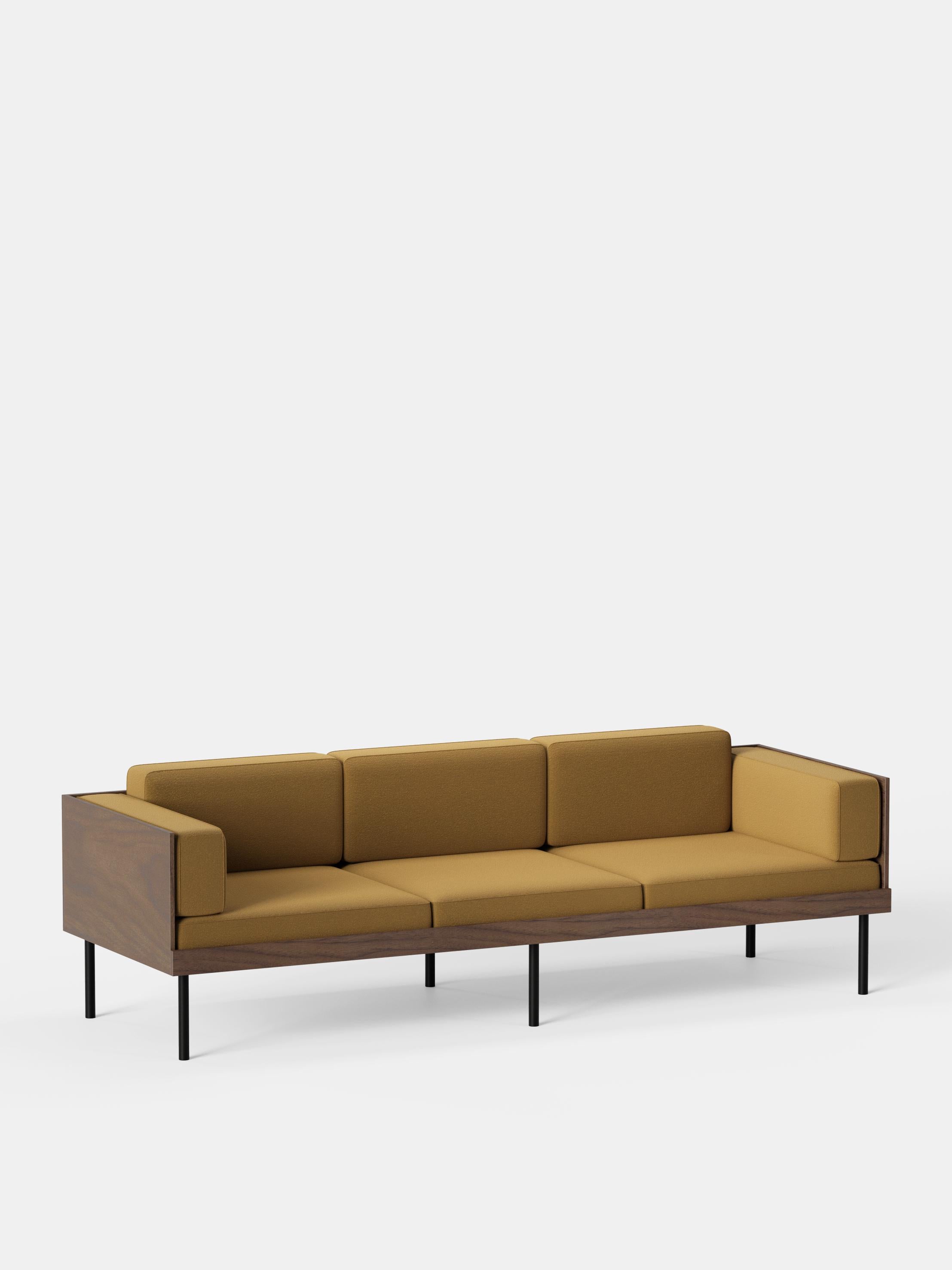 Ochre Cut Sofa by Kann Design
Dimensions: D 80 x W 230 x H 72 cm.
Materials: Solid wood, steel, wood veneer, HR foam, fabric upholstery Kvadrat Baru 450 (90% wool, 10% nylon).
Available in other fabrics.

The Cut sofa has a deep, comfortable seat