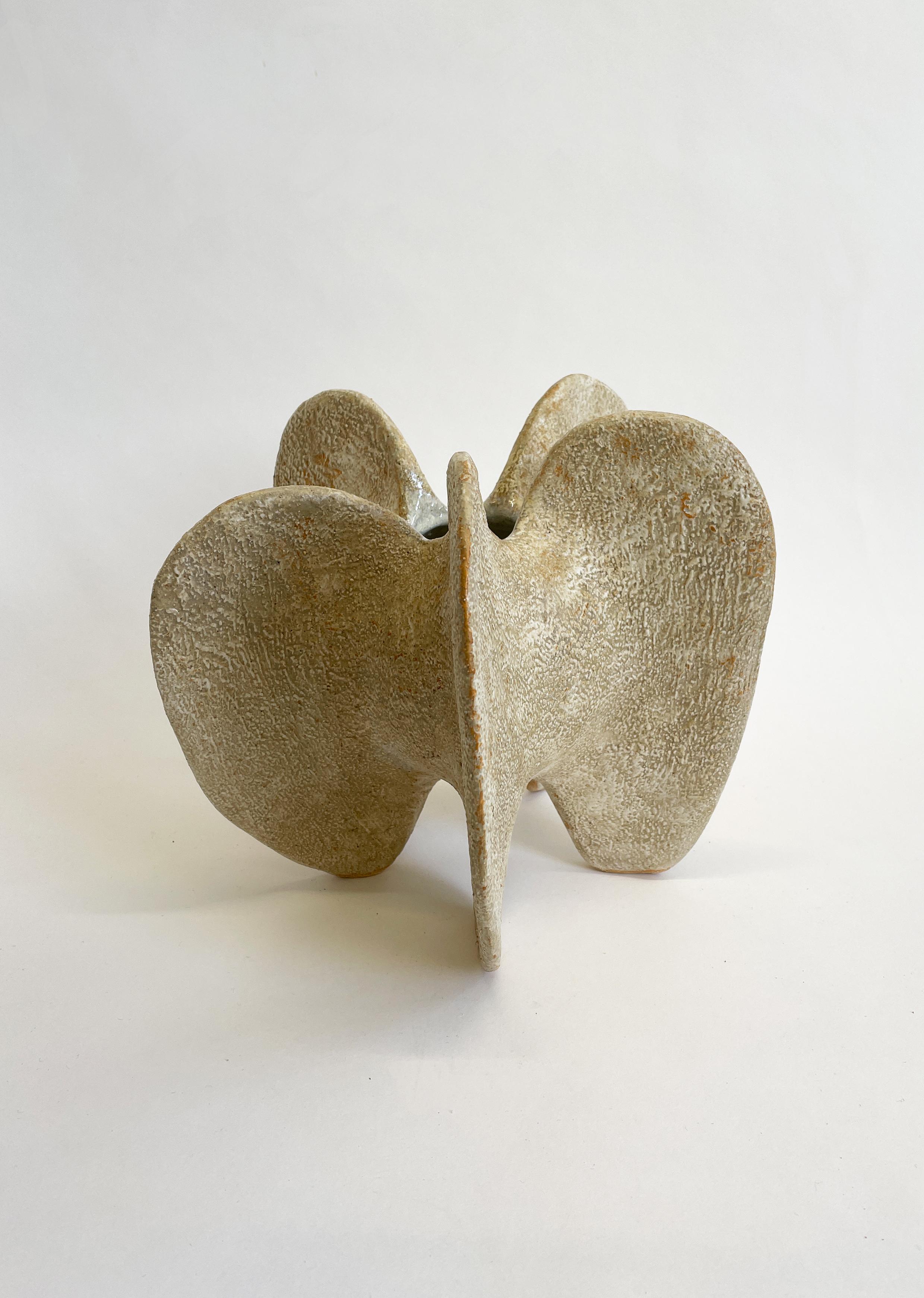 Ochre mid pentacle III by Julie Nelson.
One of a kind.
Dimensions: W 24 x D 30 x H 22 cm.
Materials: ceramic stoneware and porcelain.

Artist Julie Nelson uses the materiality of clay as a means to explore naturally occurring patterns and