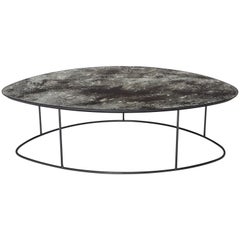 Table basse en galets de lune ocre, verre mercuré et acier, excellent état