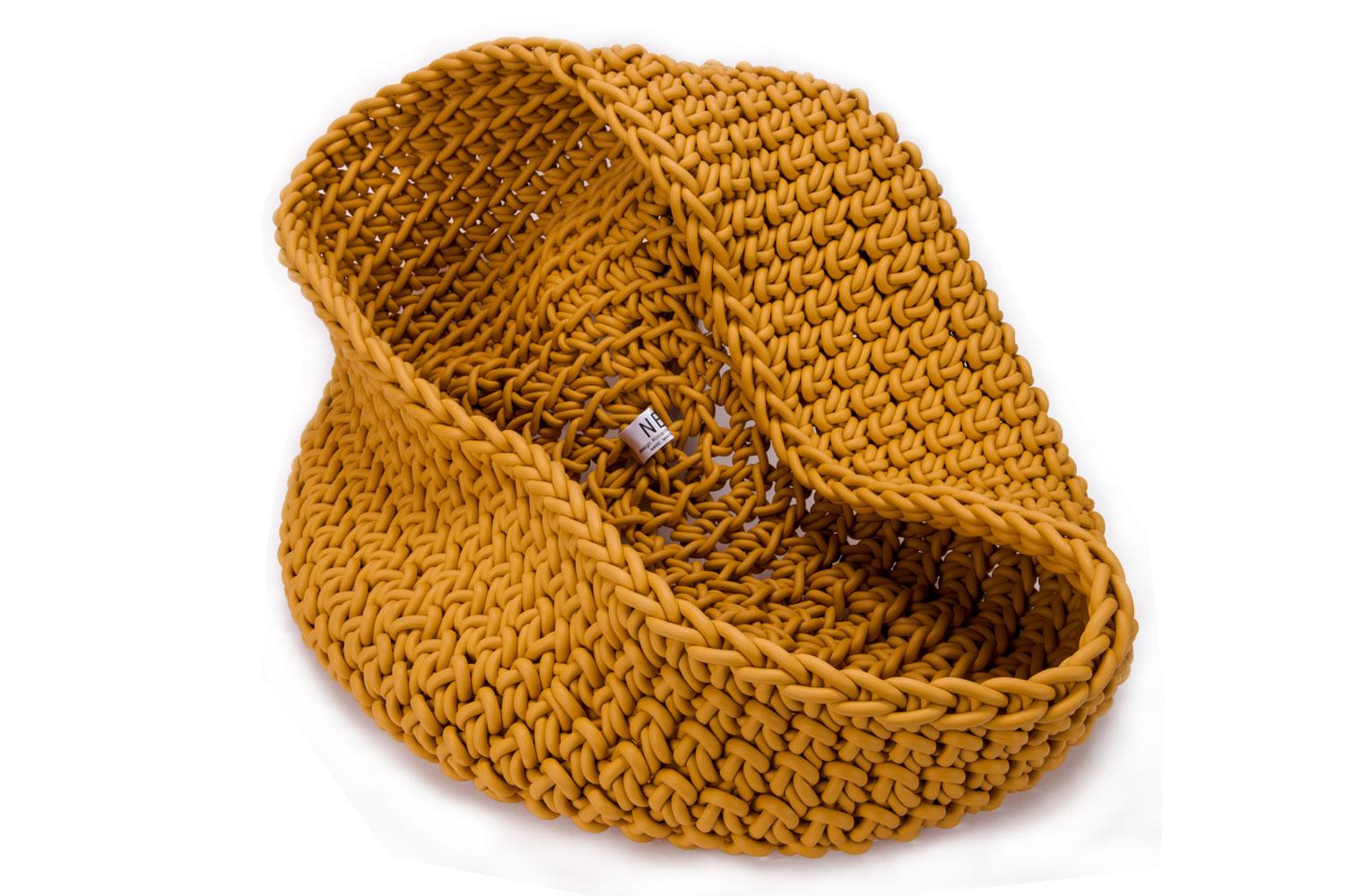 Hand knit in Italy, this yellow ochre large neoprene basket is great for indoor or outdoor use. Great for all kinds of practical storage (pillows, blankets, toys, plants) and organization and super stylish and artful.

Due to the beautiful, unique