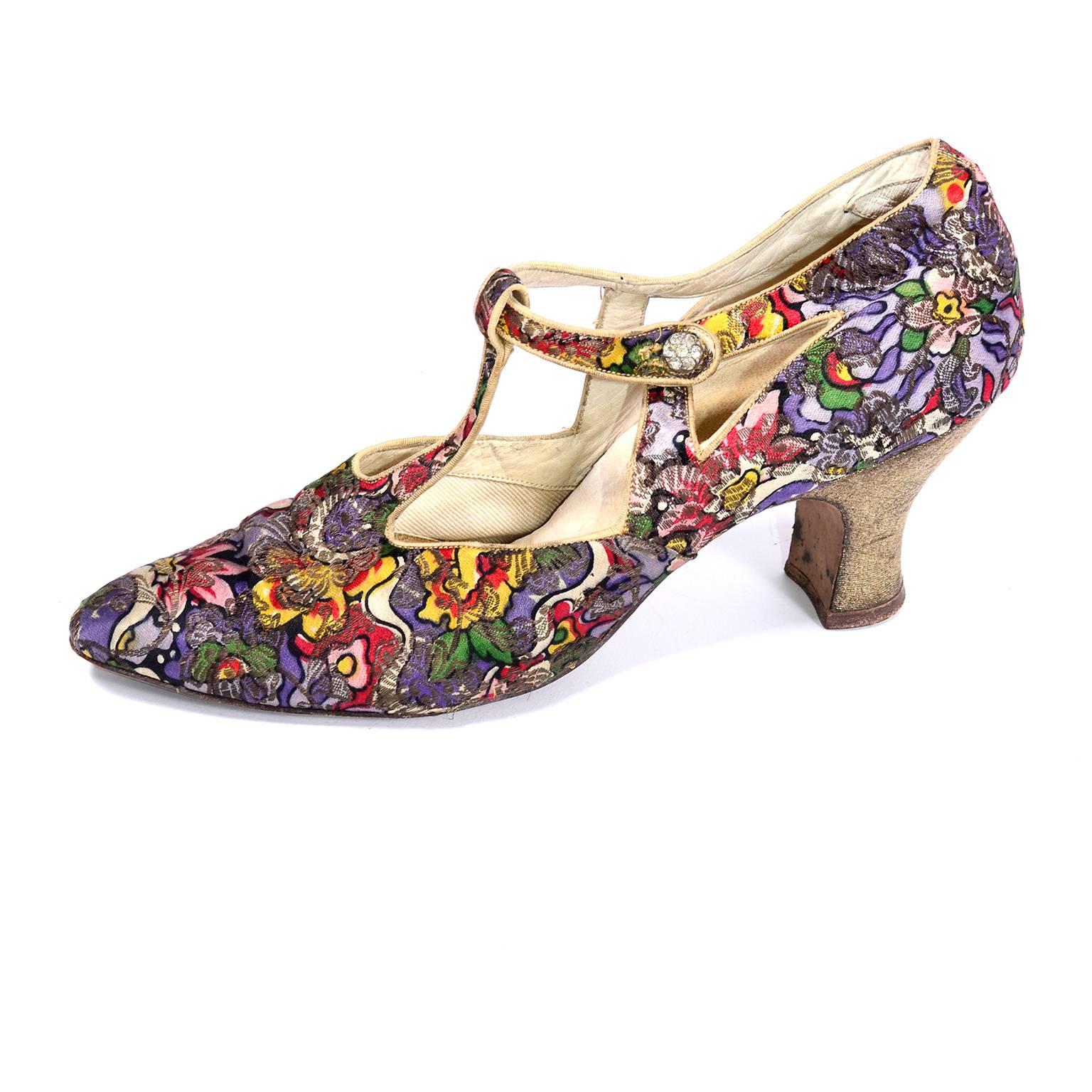 These vintage shoes came from the estate of a Chicago socialite who owned the Harry Collins dress we have on 1stdibs. Everything she owned was truly sensational and this pair of T strap heels is no exception. The shoes are in a multi floral brocade