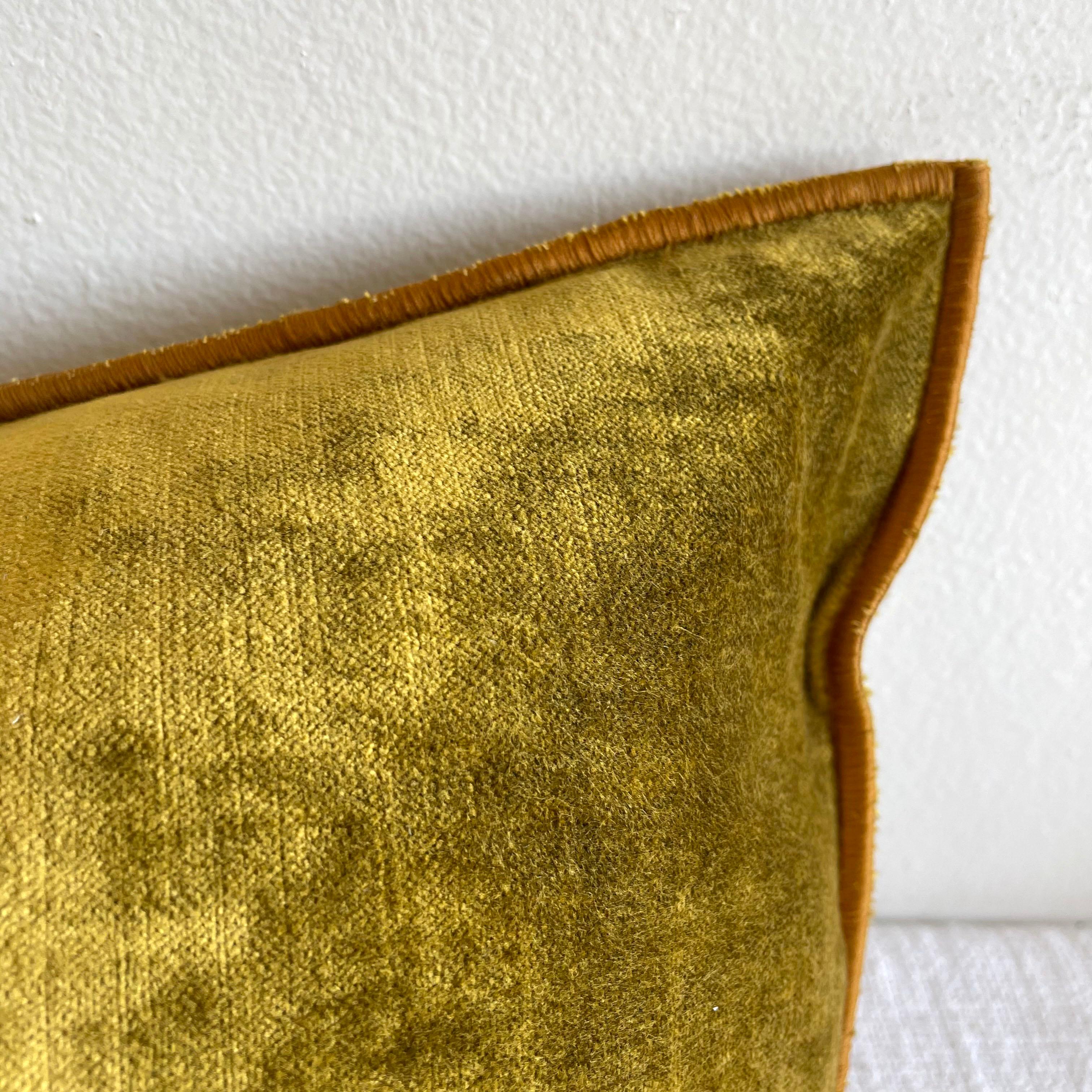 Beautiful rich mustard yellow vintage style velvet lumbar with binded edge. Metal zipper closure, and leather pull.

Custom made in Paris, France.

Size: 12? x 20?.